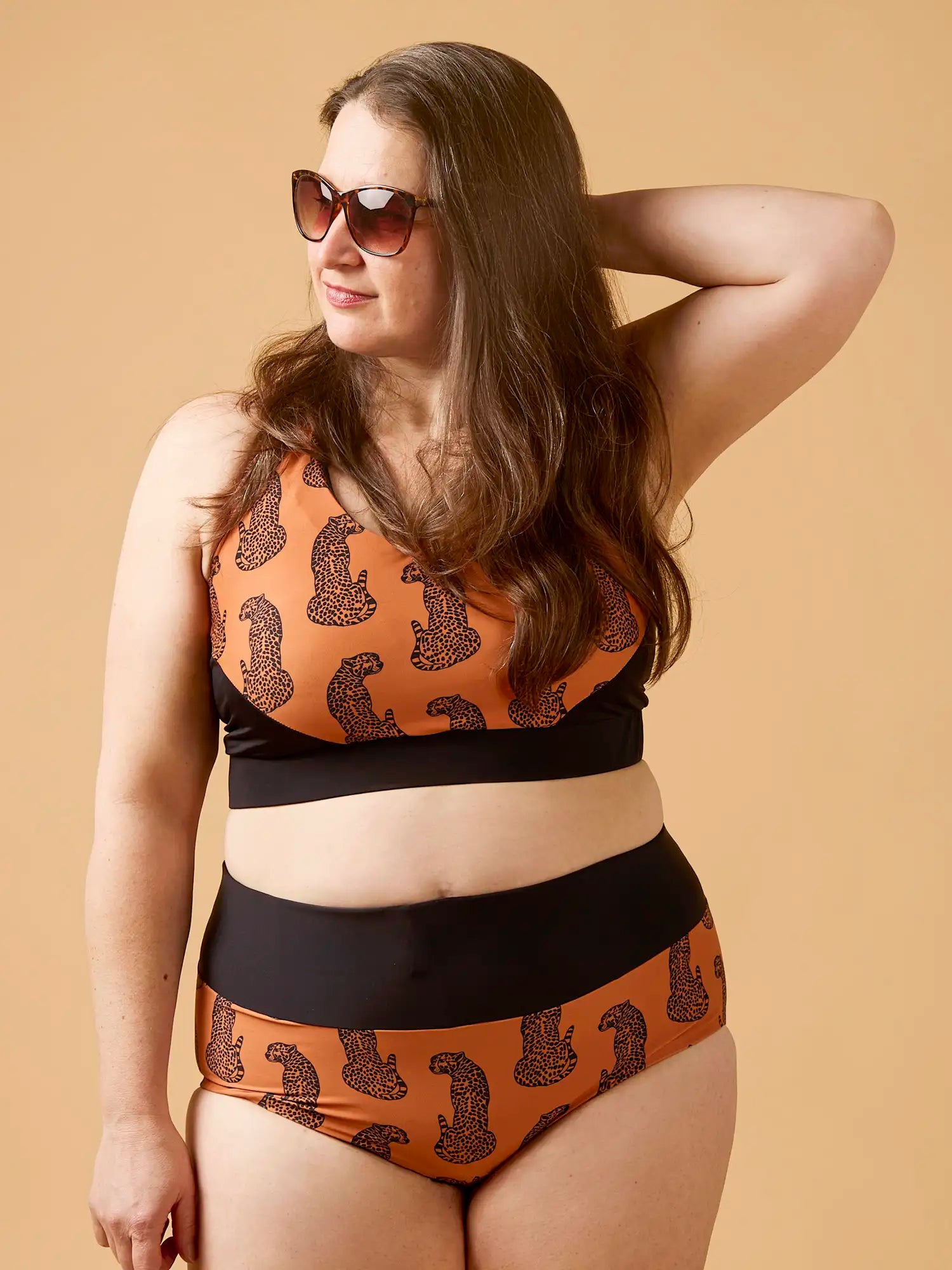 F-NYL025 Cheetah the Heat Print Swim Performance Knit Terracotta and Black  -model| Core-Fabrics