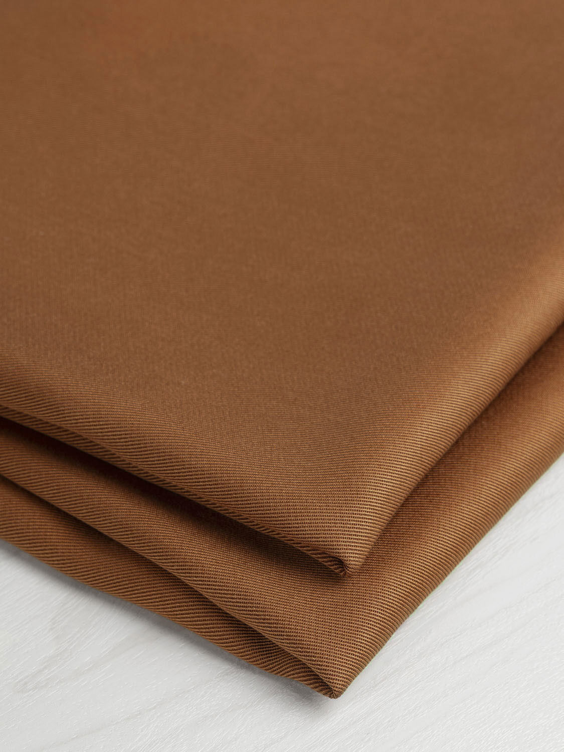 F-TEN010-005-Lyocell-Twill-Rust-Core-Fabrics-fold-1.jpg