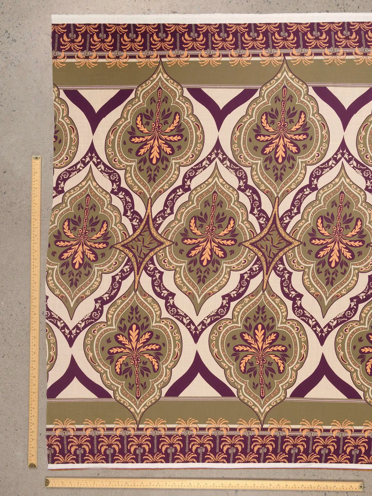 F-VIS319-Ornemental-Palm-Tree-Border-Print-Textured-Viscose-Olive-Aubergine-Oat-and-Coral-Core-Fabrics-ruler.webp