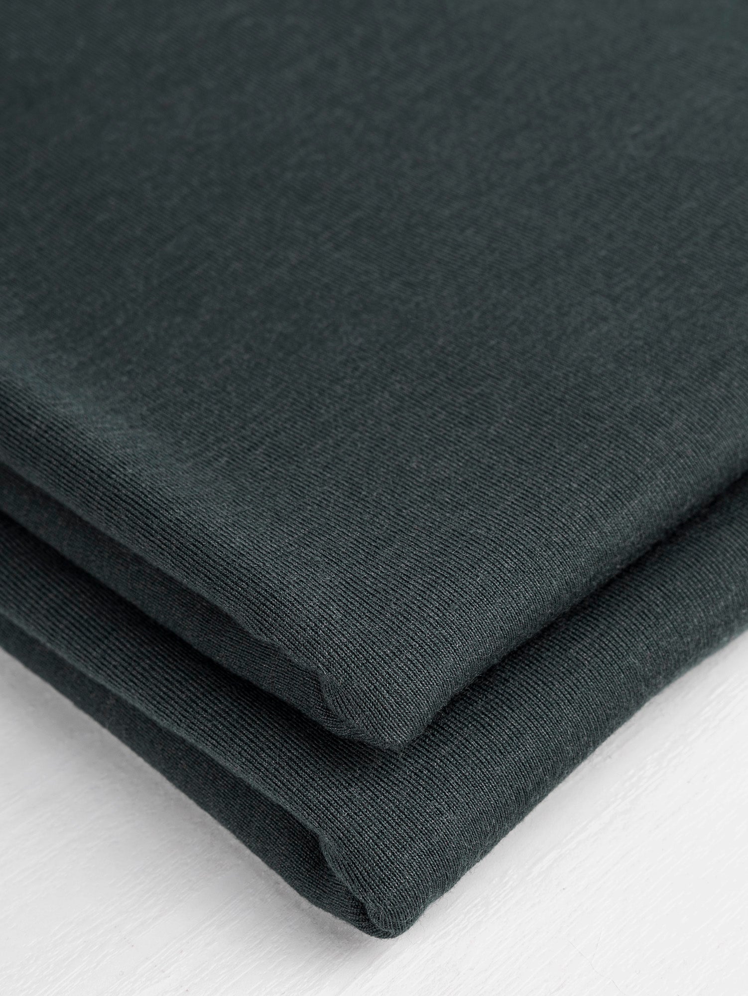 Lightweight 100% Merino Wool Jersey Knit Deadstock - Dark Green | Core Fabrics