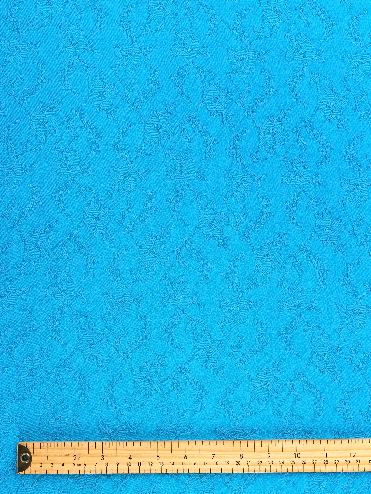 F-DEA197-Floral-Cotton-Viscose-Jacquard-Deadstock-Aqua-Core-Fabrics-ruler.webp