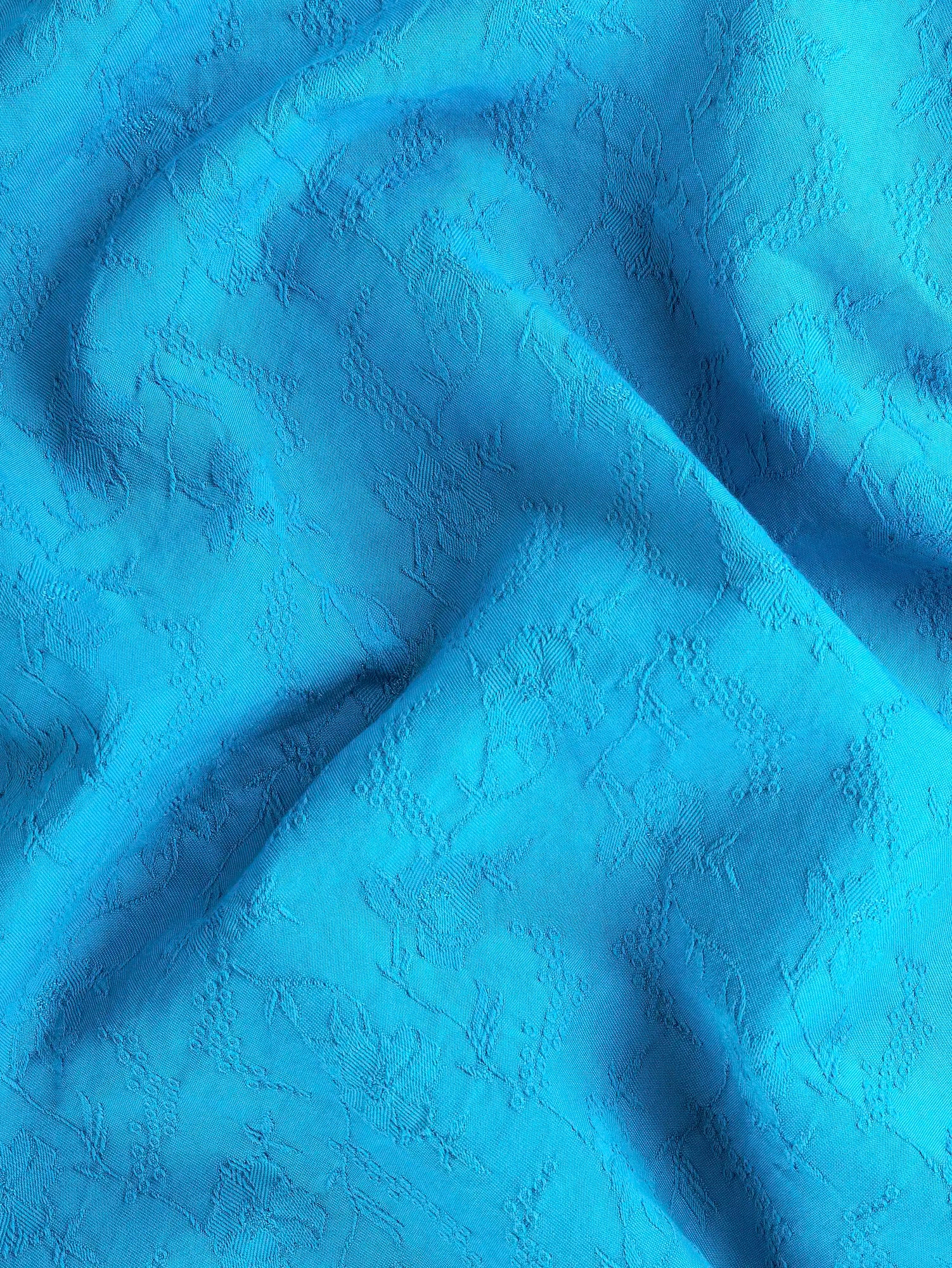 F-DEA197-Floral-Cotton-Viscose-Jacquard-Deadstock-Aqua-Core-Fabrics-scrunched.webp