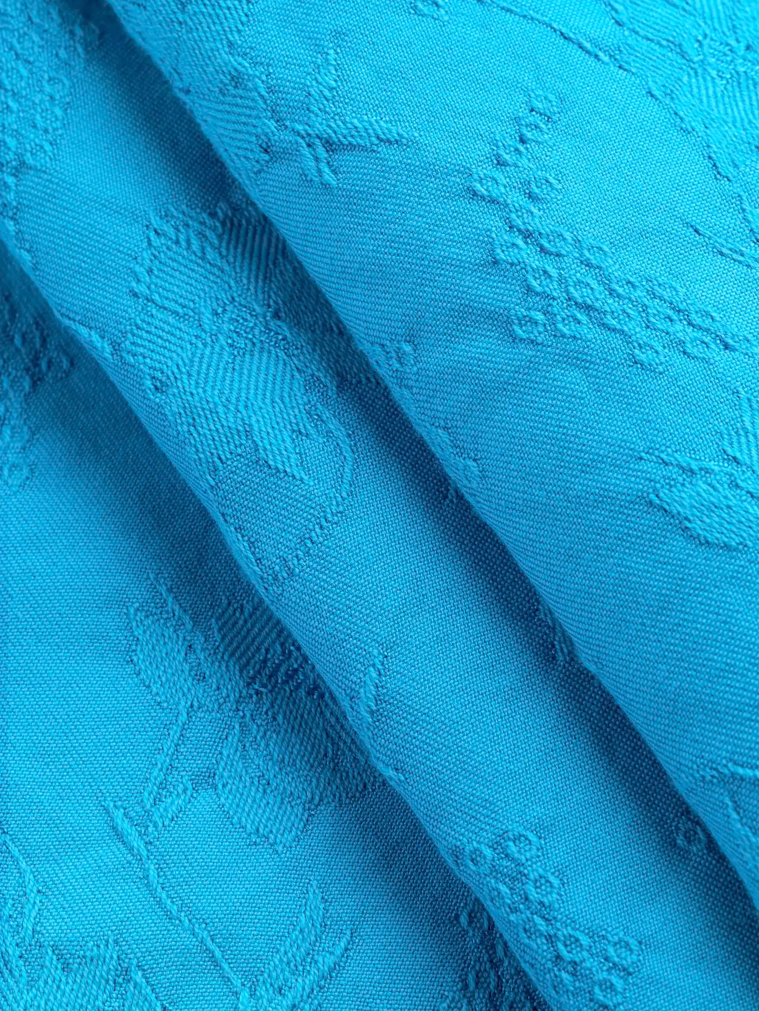 F-DEA197-Floral-Cotton-Viscose-Jacquard-Deadstock-Aqua-Core-Fabrics-fold.webp