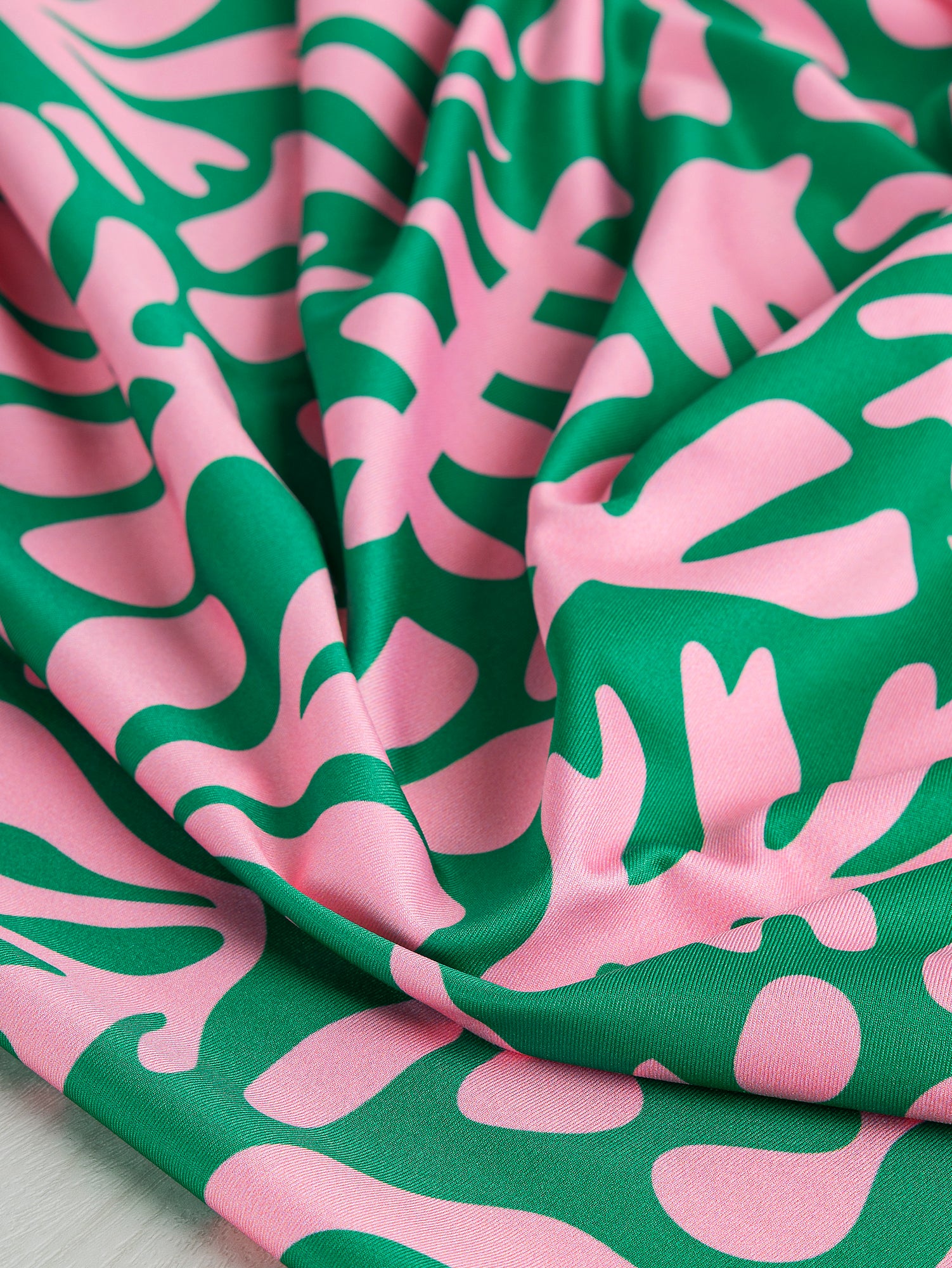 F-PES036-001-Floral-Cut-Out-Recycled-Swim-Performance-Knit-Green-Pink-Core-Fabrics-scrunched.JPG