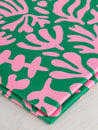 F-PES036-001-Floral-Cut-Out-Recycled-Swim-Performance-Knit-Green-Pink-Core-Fabrics-fold.JPG