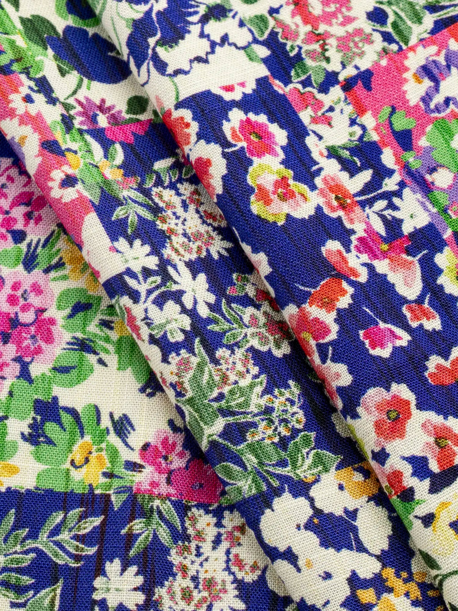 F-VIS308-Floral-Patchwork-Print-Textured-Ecovero-Viscose-Butter-Cobalt-and-Green-Core-Fabrics-fold.webp