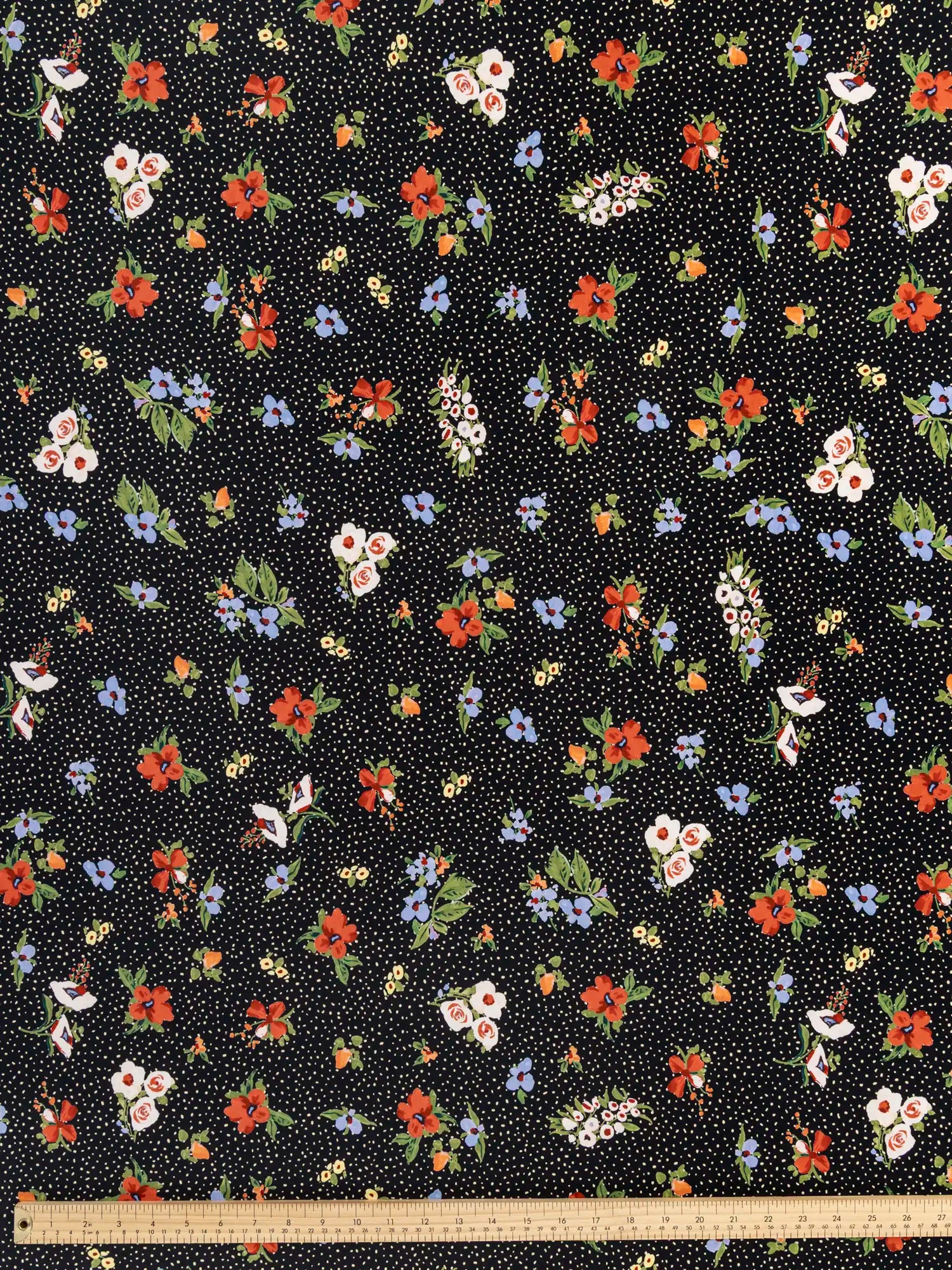 F-COT443-Floral-Polka-Dot-Print-BCI-Cotton-Poplin-Black-Cream-and-Multicolour-Core-Fabrics-ruler.webp