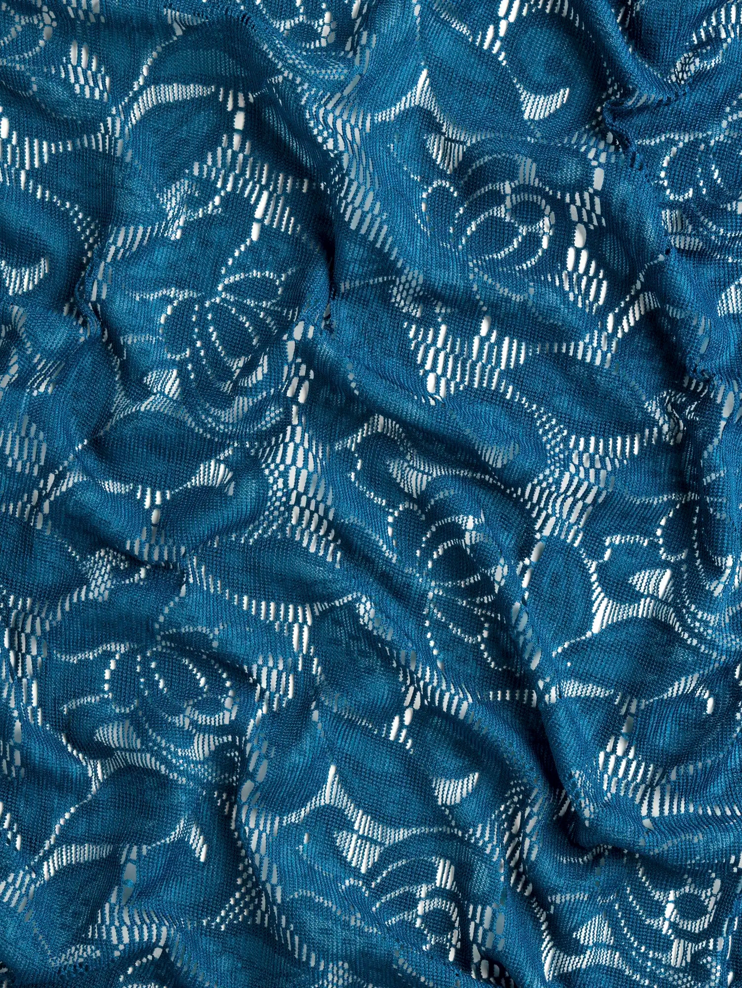 F-DEA185-Floral-Stretch-Lace-Deadstock-Deep-Teal-Core-Fabrics-scrunched.webp