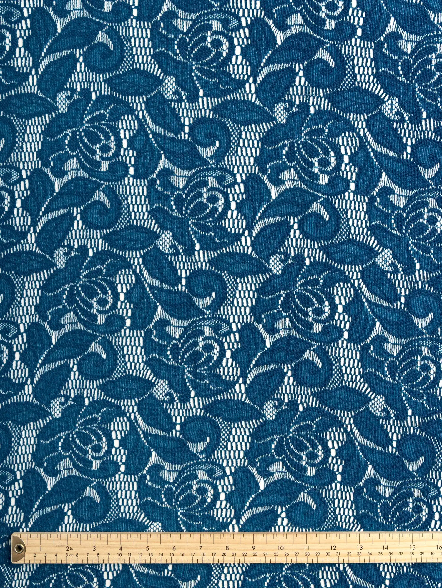 F-DEA185-Floral-Stretch-Lace-Deadstock-Deep-Teal-Core-Fabrics-ruler.webp