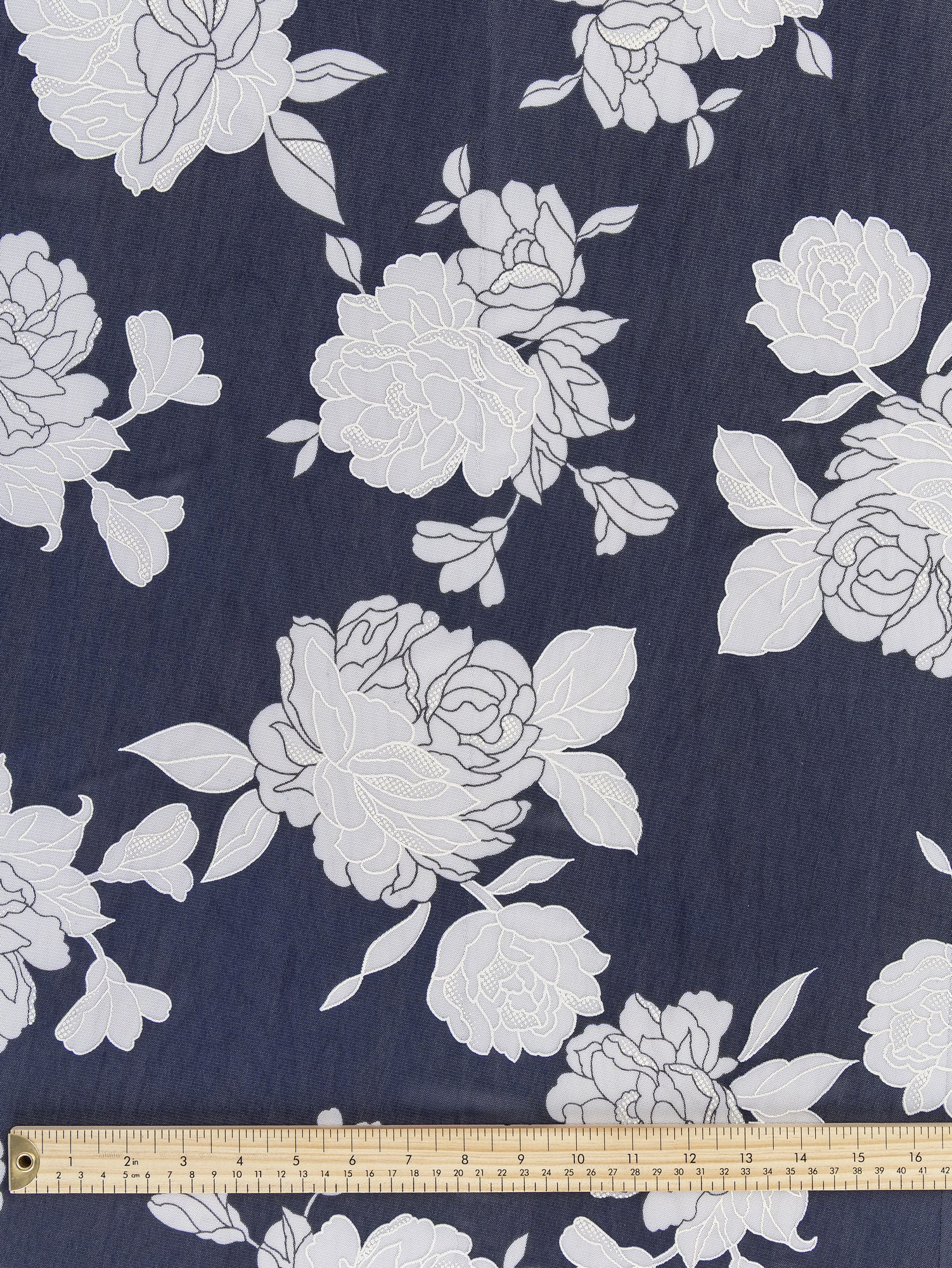 F-DEA041-Floral-Stretch-Mesh-Deadstock-Navy-and-White-Core-Fabrics-ruler.JPG
