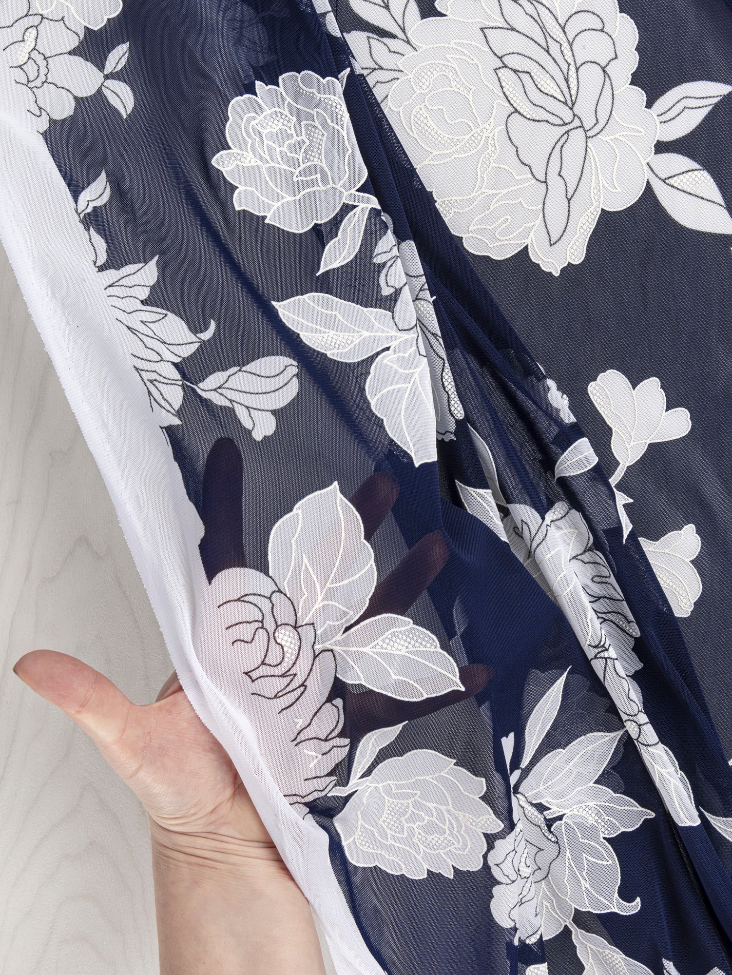F-DEA041-Floral-Stretch-Mesh-Deadstock-Navy-and-White-Core-Fabrics-sheer.JPG