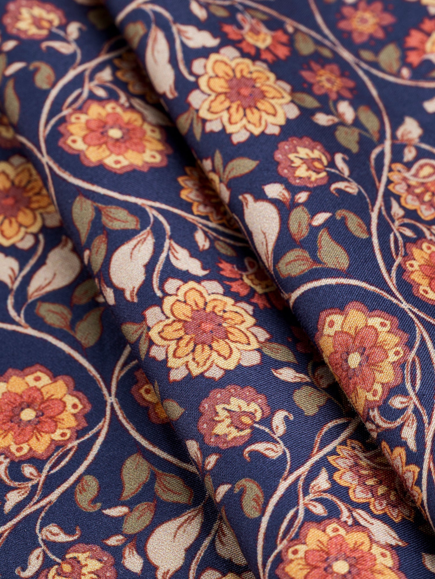 F-COT389-Floral-Trellis-Border-Print-Cotton-Lawn-Indigo-Terracotta-and-Olive-Core-Fabrics-fold.JPG