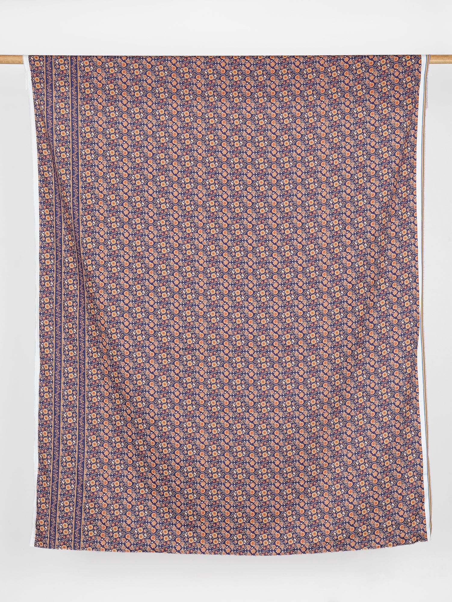 F-COT389-Floral-Trellis-Border-Print-Cotton-Lawn-Indigo-Terracotta-and-Olive-Core-Fabrics-draped.JPG