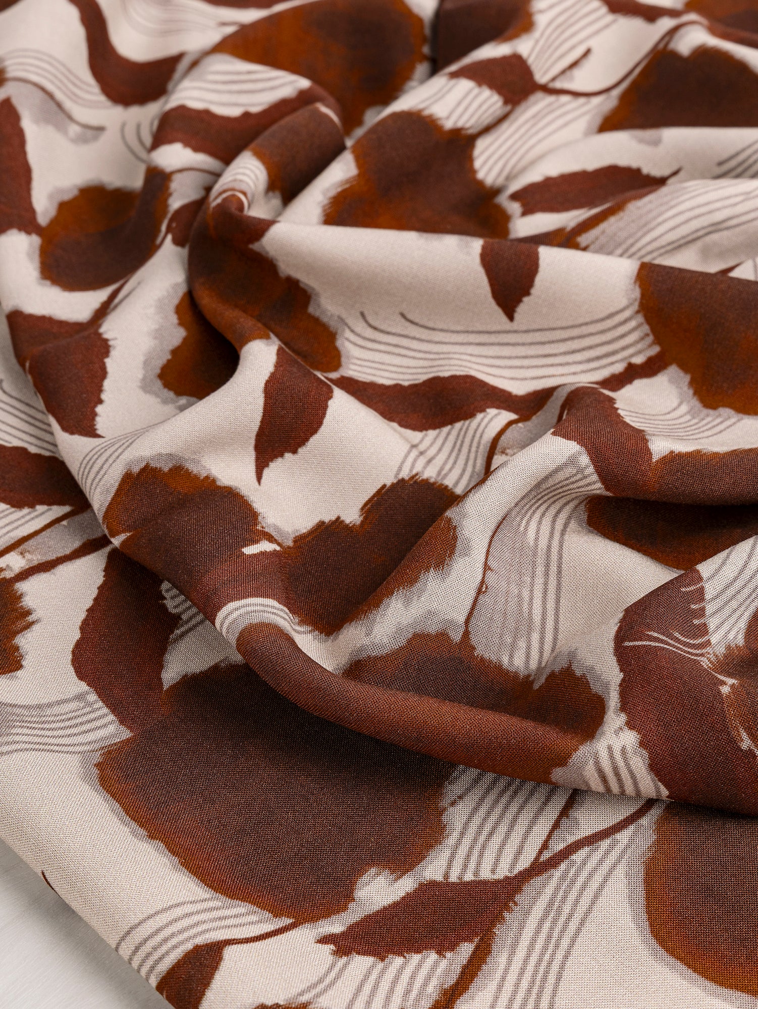 F-DEA028-002-Flower-Print-Viscose-Deadstock-Cream-and-Sienna-Core-Fabrics-scrunched.JPG