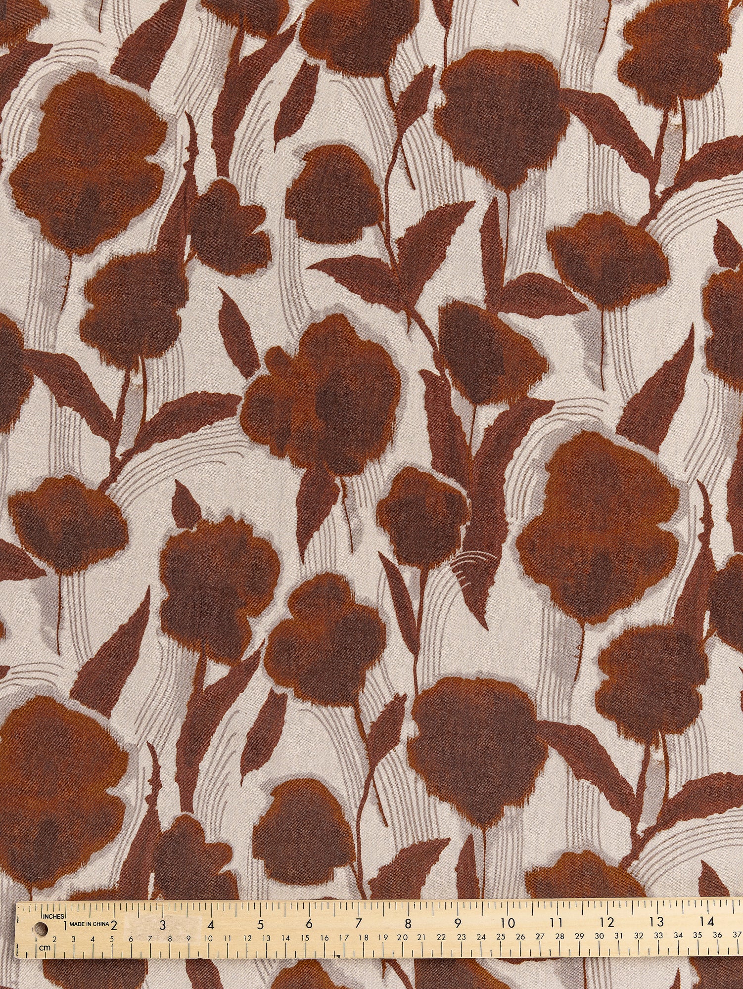 F-DEA028-002-Flower-Print-Viscose-Deadstock-Cream-and-Sienna-Core-Fabrics-ruler.JPG