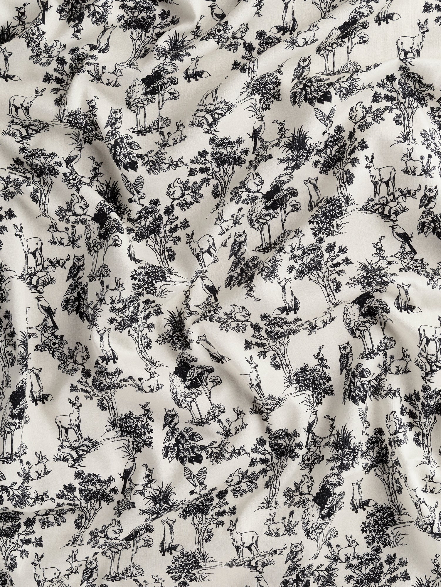 F-COT392-Forest-Friends-Toile-Print-Cotton-Lawn-Cream-Black-Core-Fabrics-scrunched.JPG