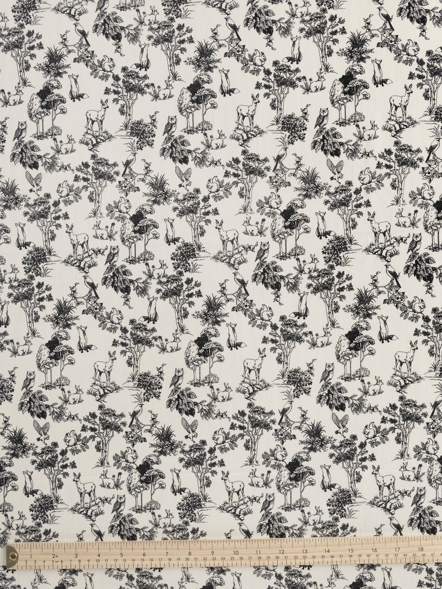 F-COT392-Forest-Friends-Toile-Print-Cotton-Lawn-Cream-Black-Core-Fabrics-ruler.JPG