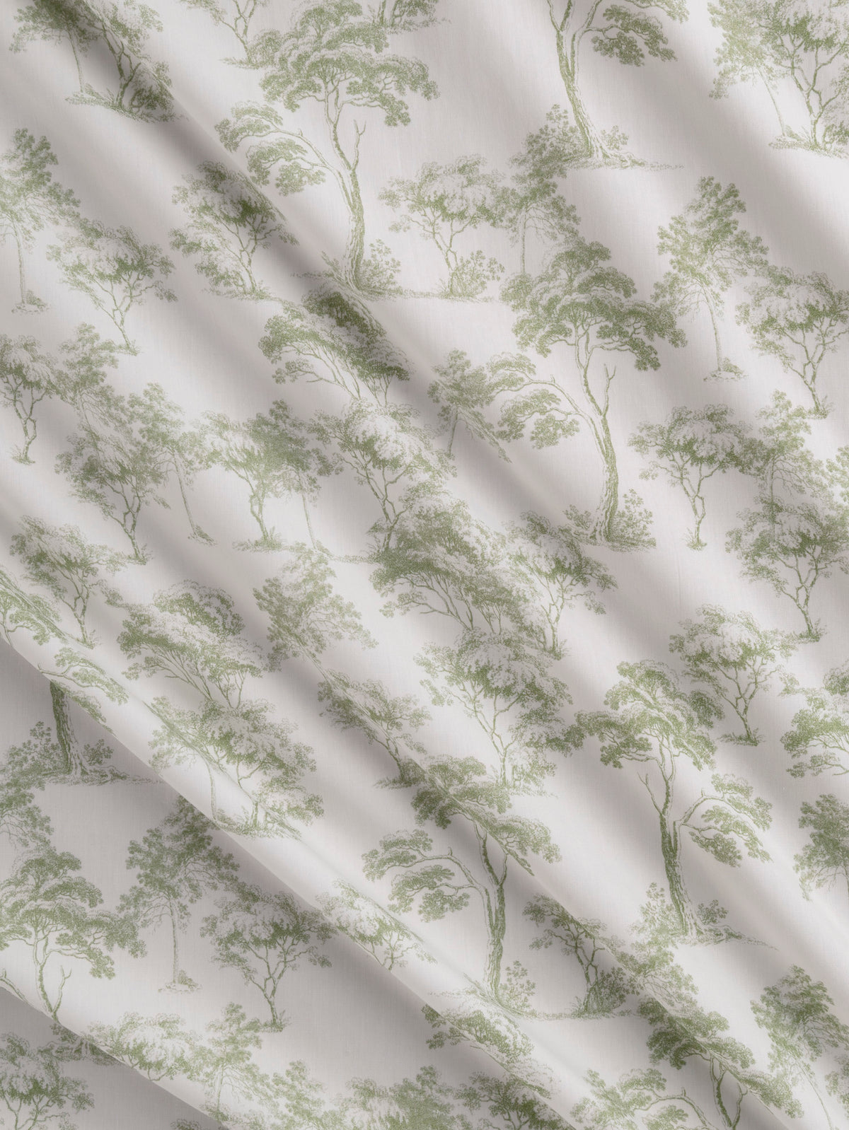 F-COT501-Forest-Toile-de-Jouy-Print-Cotton-Poplin-White-and-Olive-Core-Fabrics-scrunched.webp