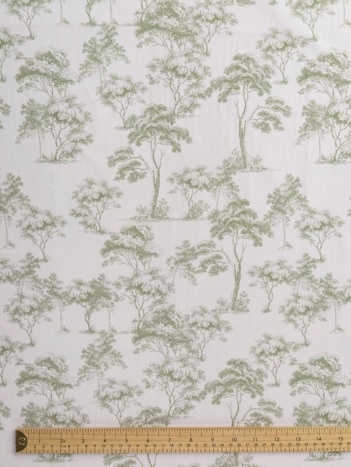 F-COT501-Forest-Toile-de-Jouy-Print-Cotton-Poplin-White-and-Olive-Core-Fabrics-ruler.webp