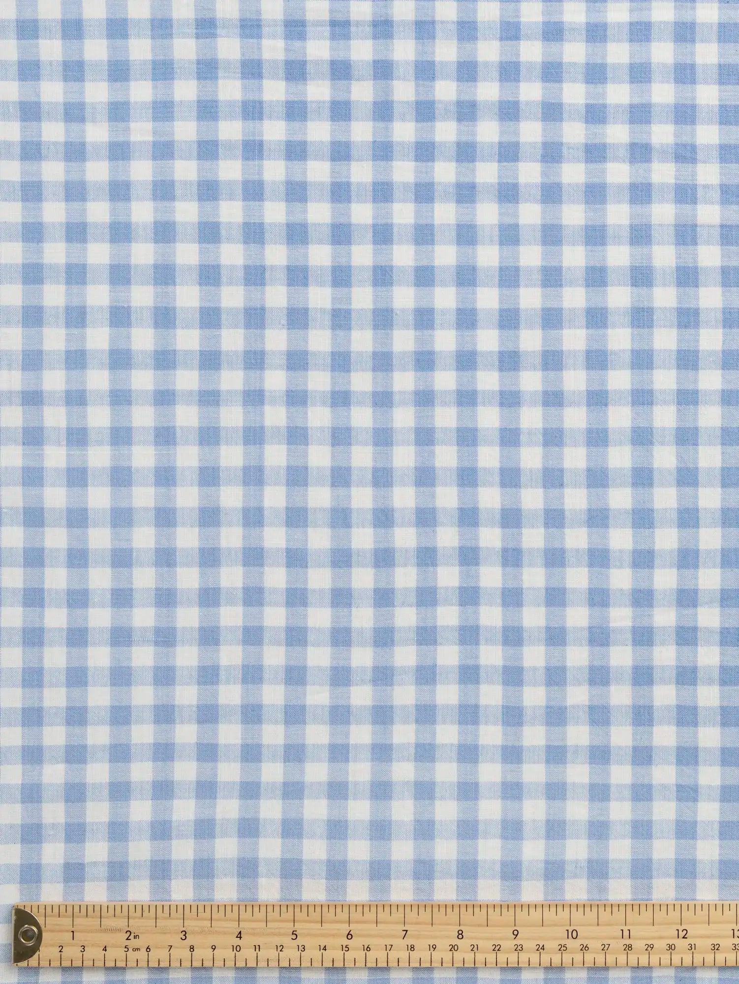 F-COT352-008-Forget-Me-Not-Handwoven-Gingham-Cotton-Chambray-and-Ivory-Core-Fabrics-ruler.webp