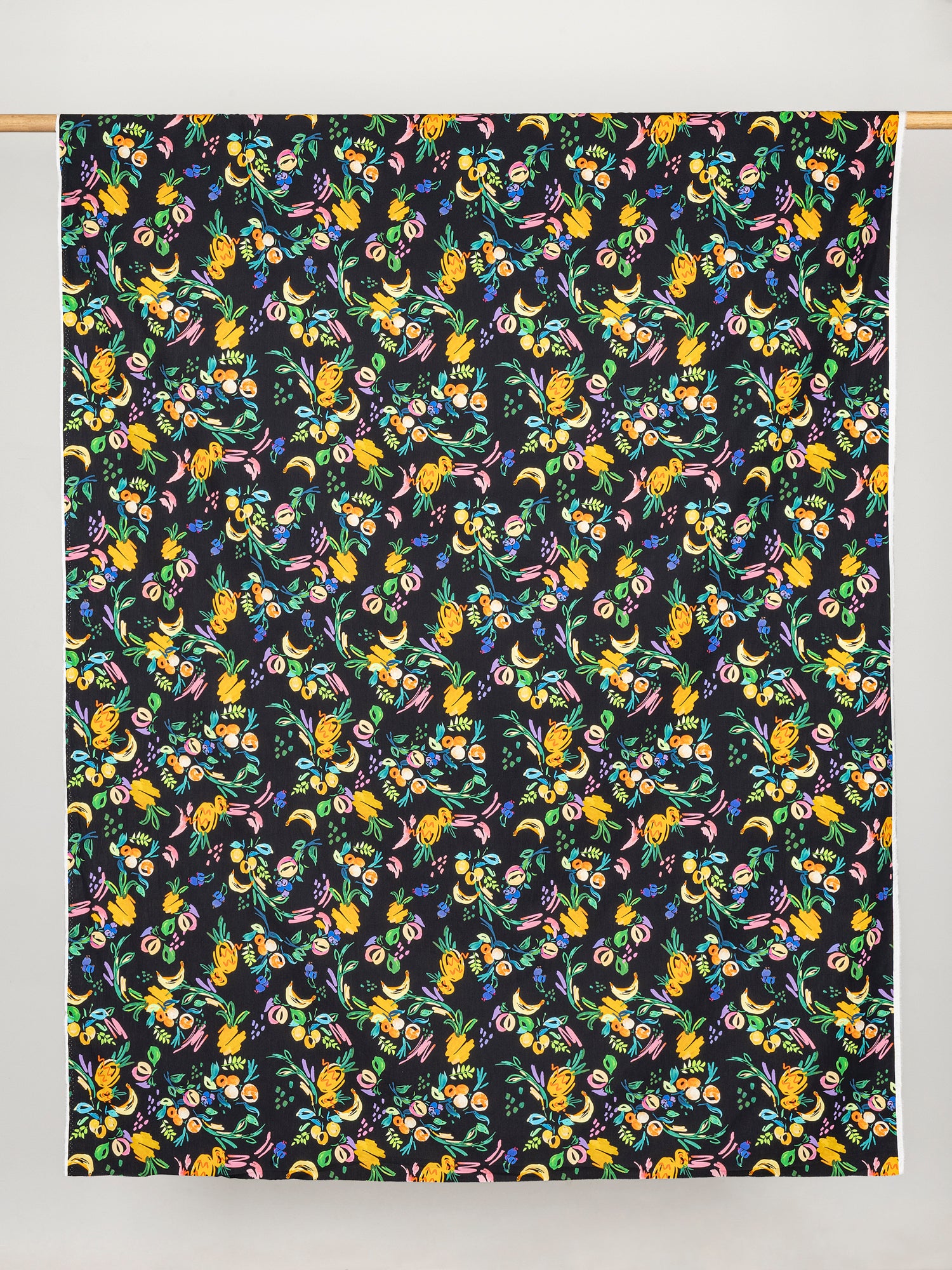 F-COT342-Fruit-Parade-Print-Cotton-Lawn-Black+Multicolour-Core-Fabrics-draped.JPG