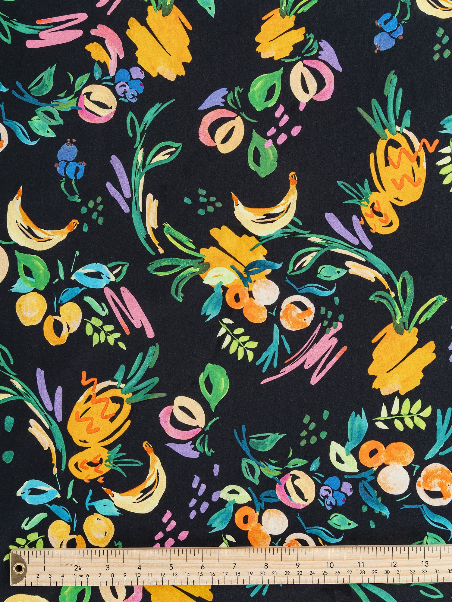 F-COT342-Fruit-Parade-Print-Cotton-Lawn-Black+Multicolour-Core-Fabrics-ruler.JPG