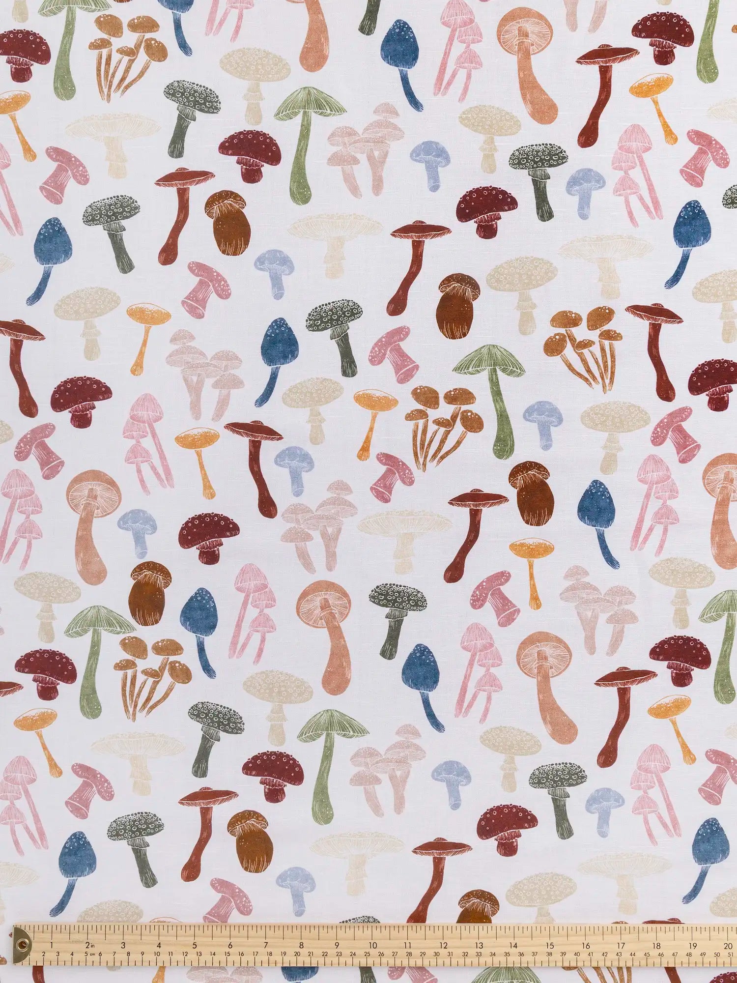 F-COT465-Fun-Guy-Print-Organic-Cotton-Linen-Ivory-and-Multicolour-Core-Fabrics-ruler.webp