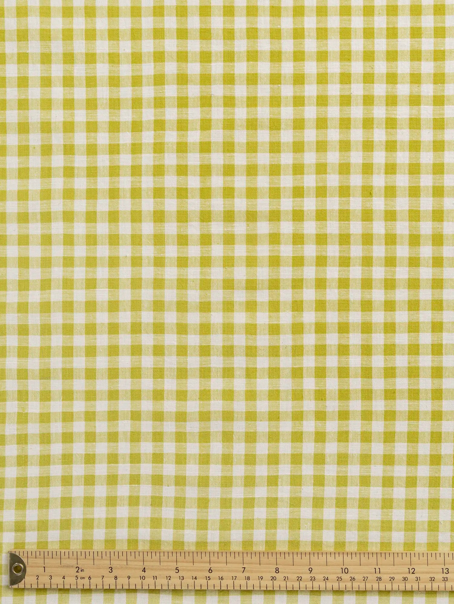 F-COT352-009-Gimlet-Handwoven-Gingham-Cotton-Chartreuse-and-Ivory-Core-Fabrics-ruler.webp