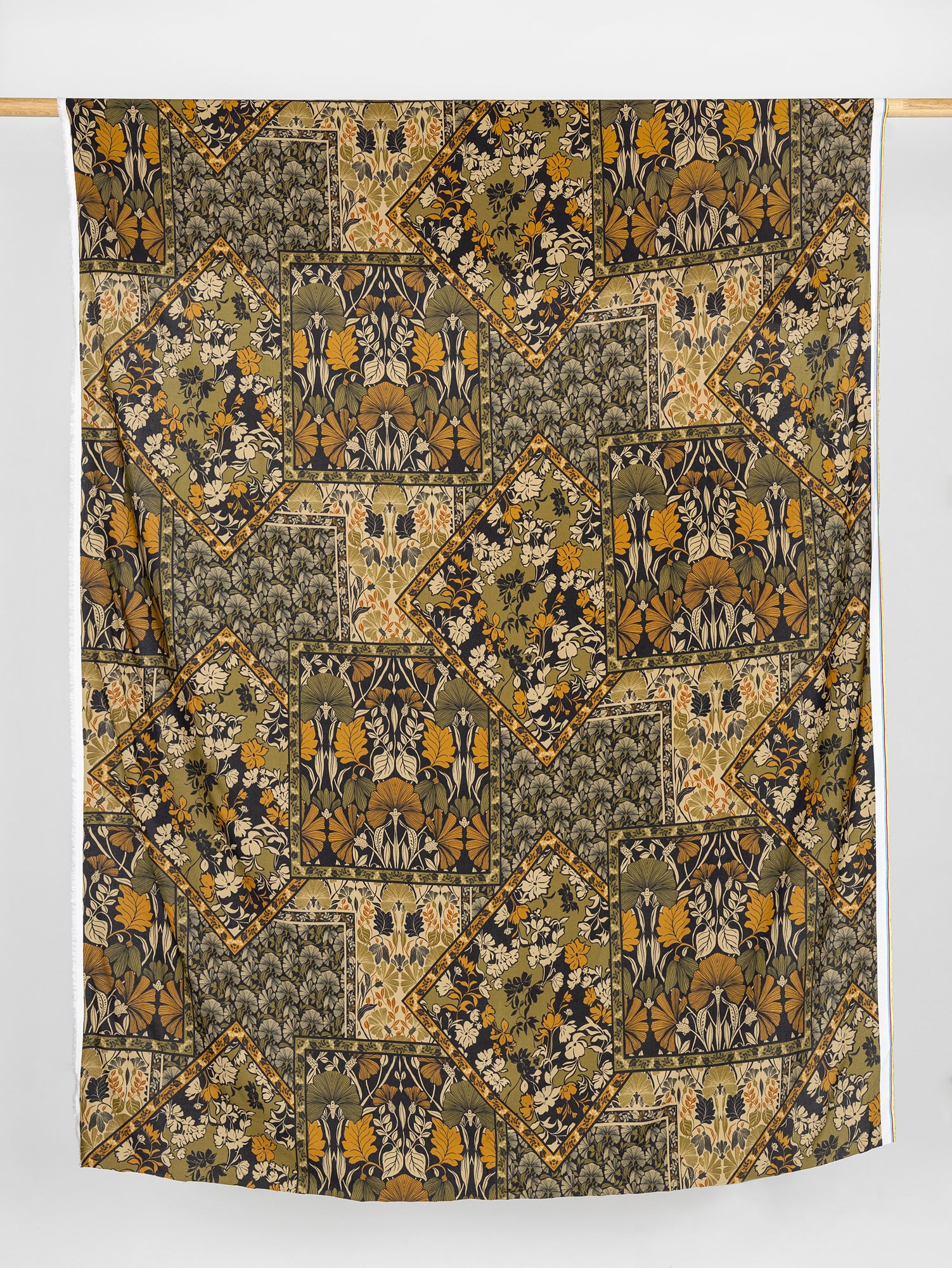F-VIS280-Ginkgo-Tapestry-Print-Ecovero-Viscose-Olive-Black-Turmeric-Core-Fabrics-draped.JPG