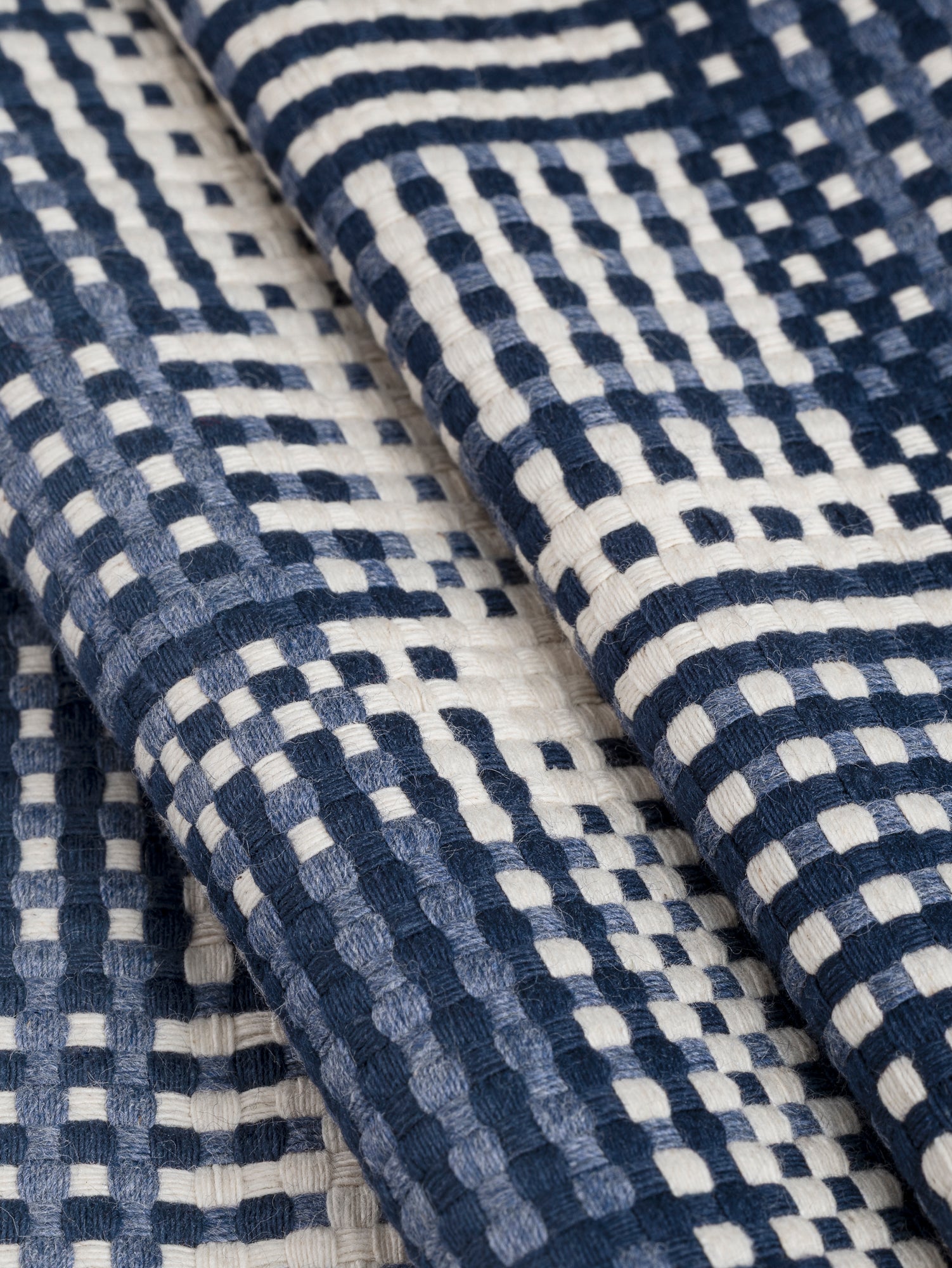 F-JAC027-Grid-Plaid-Cotton-Jacquard-Indigo-Cream-Core-Fabrics-fold.JPG