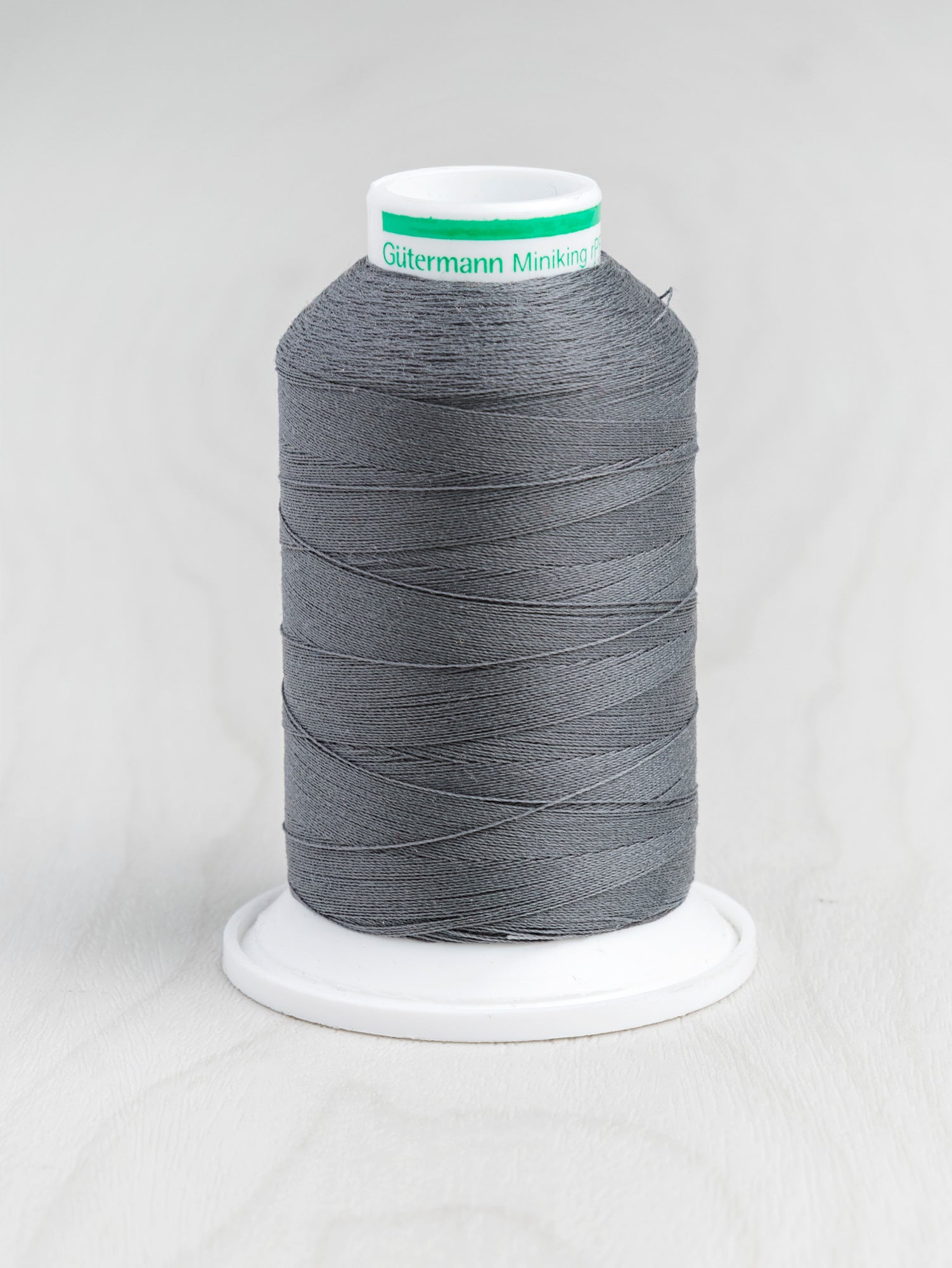 T-rPET003-701-Gütermann-Serger-rPET-Recycled-Thread-Medium-Dark-Grey-Core-Fabrics.JPG