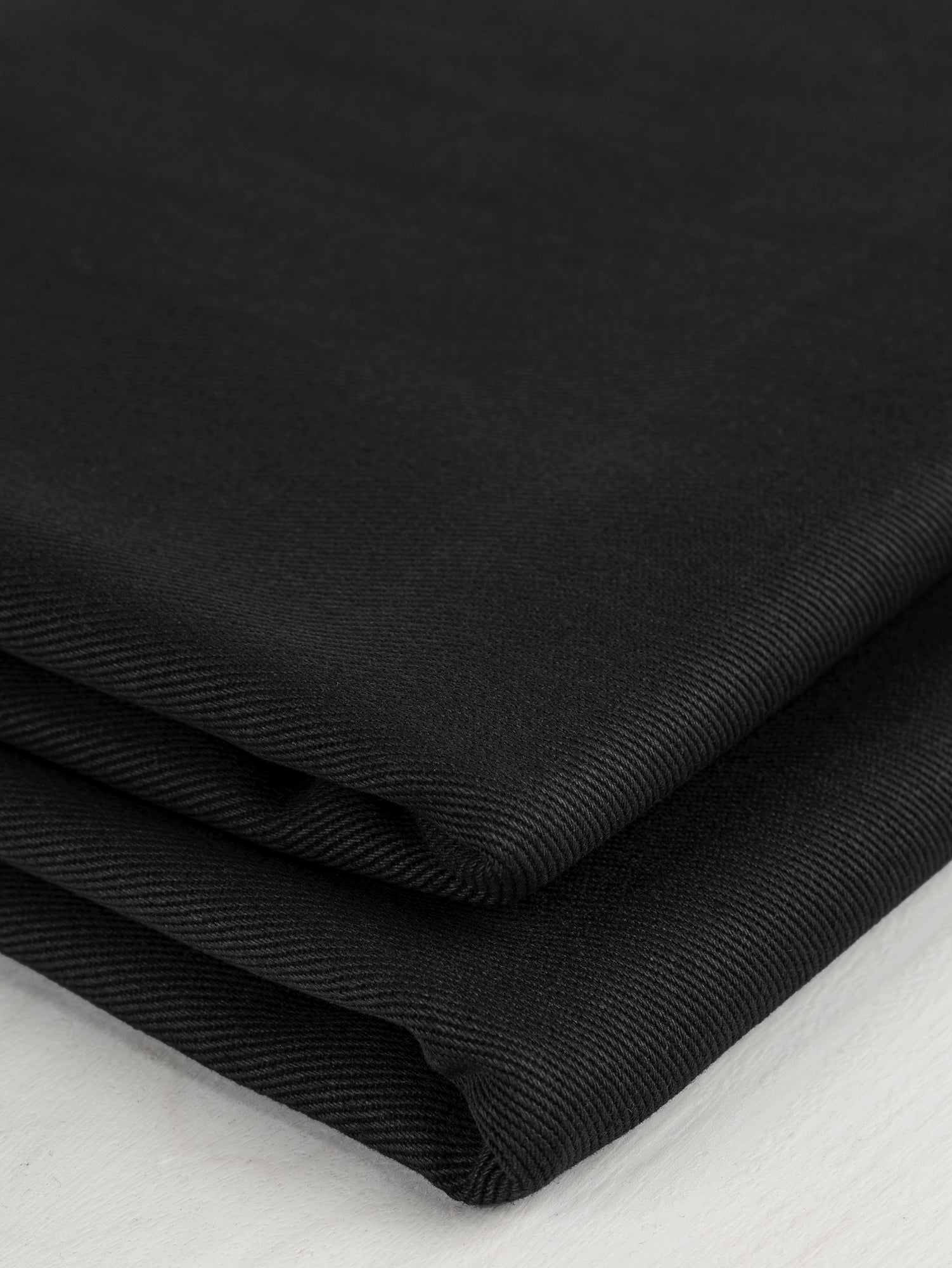 F-COT350-001-Heavyweight-Organic-Cotton-Twill-Black-Core-Fabrics-fold.JPG