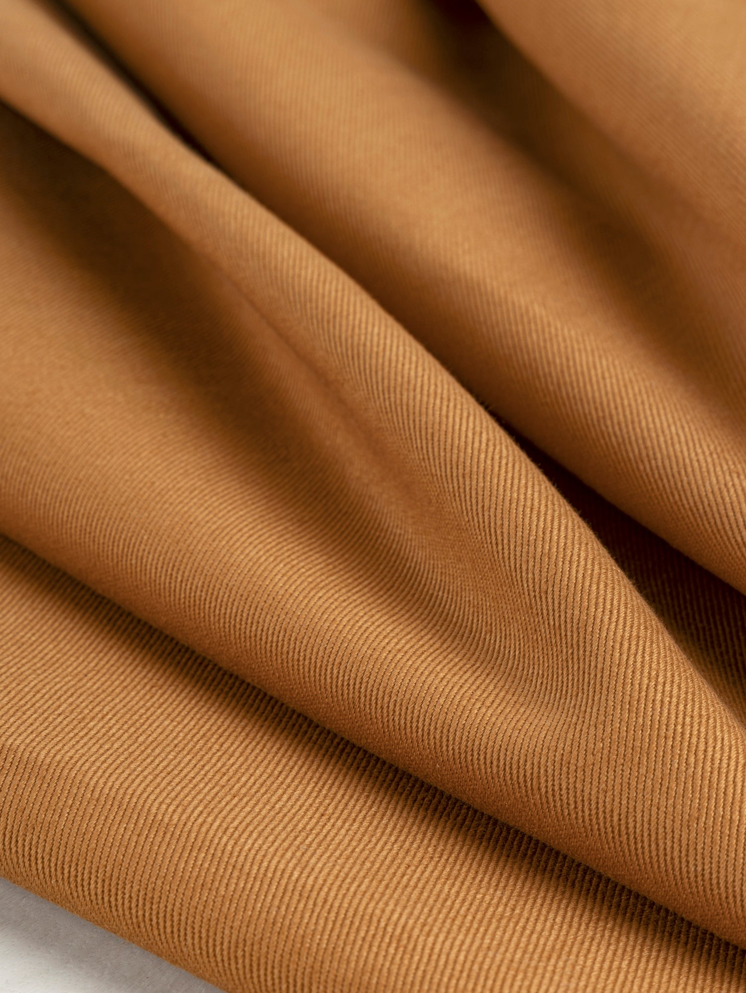 F-COT350-004-Heavyweight-Organic-Cotton-Twill-Caramel-Core-Fabrics-scrunched.JPG