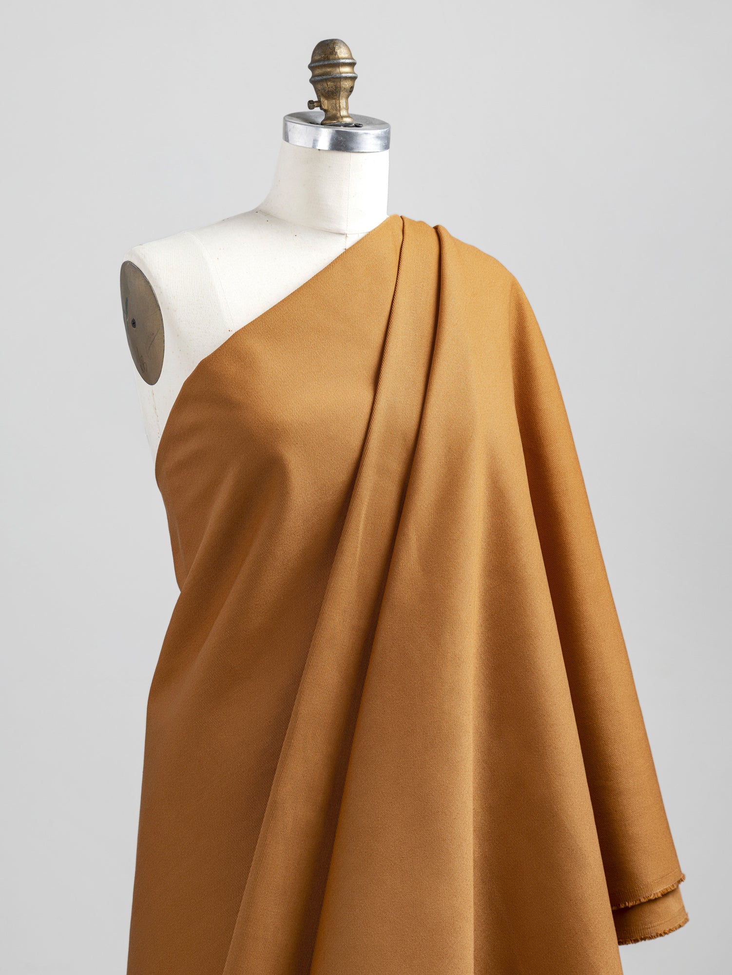 F-COT350-004-Heavyweight-Organic-Cotton-Twill-Caramel-Core-Fabrics-draped.JPG