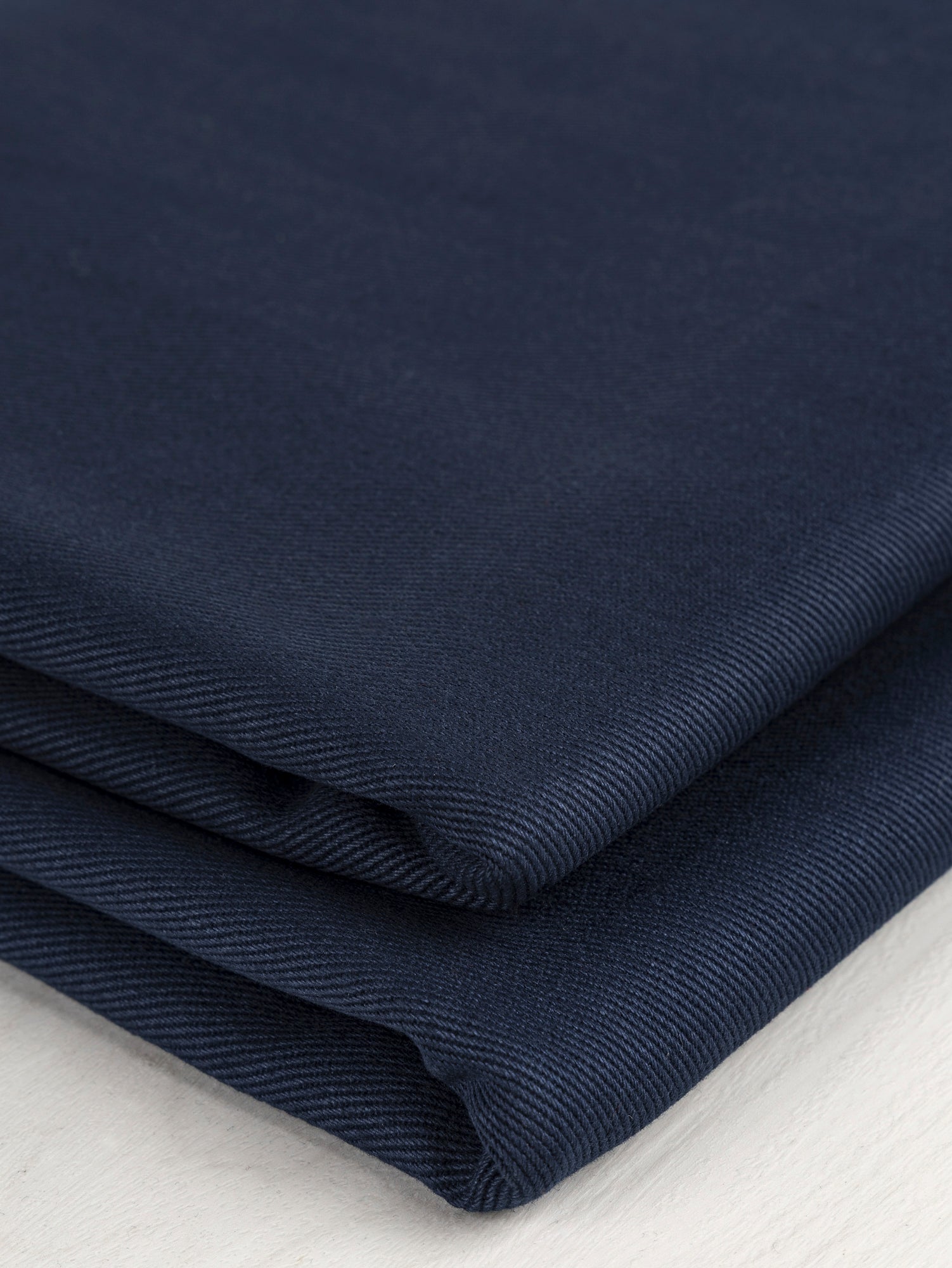 F-COT350-005-Heavyweight-Organic-Cotton-Twill-Navy-Core-Fabrics-fold.JPG