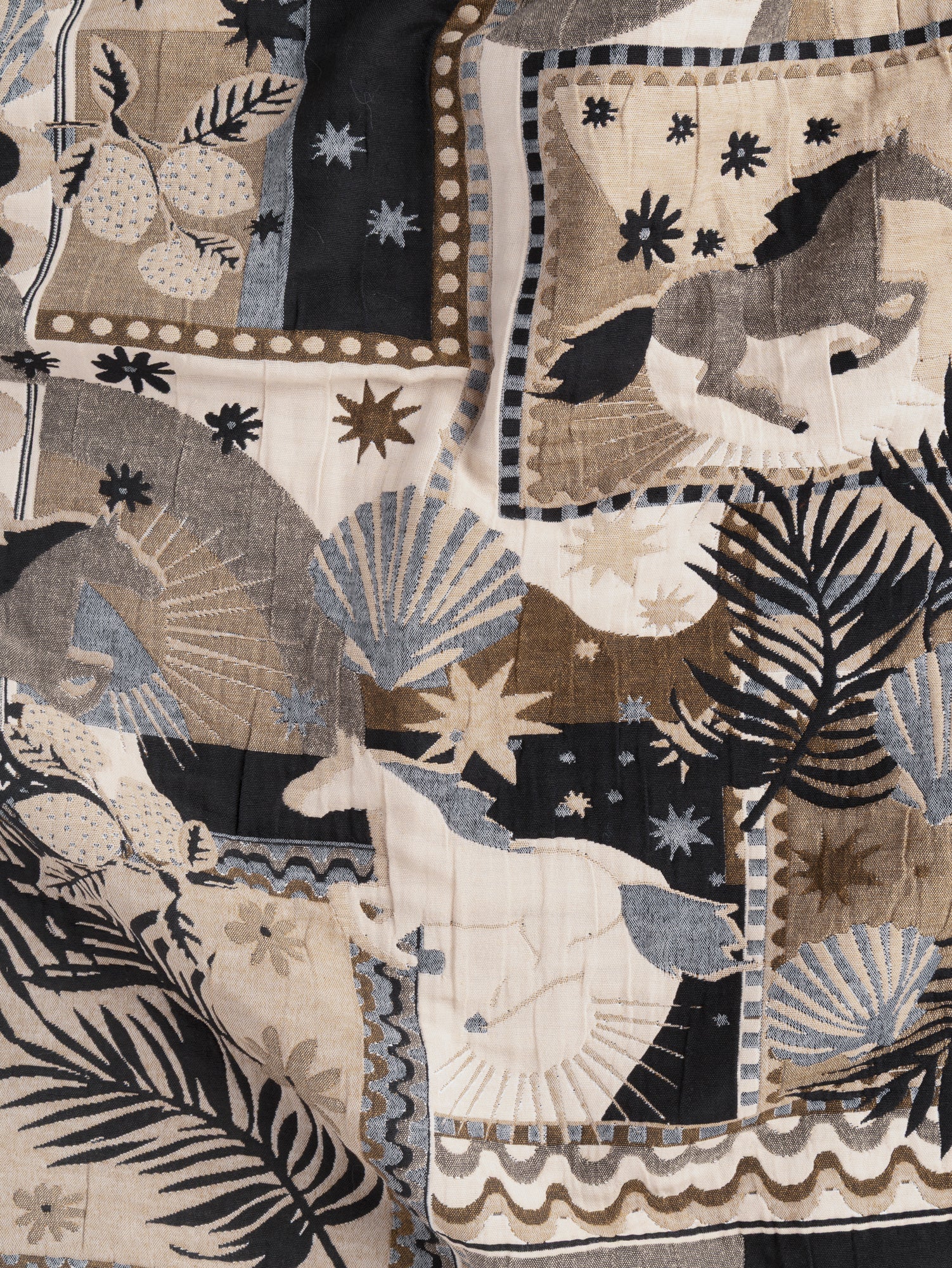 F-QUI009-Horse-Collage-Quilted-Jacquard-Cream-Black-Denim-Khaki-Core-Fabrics-scrunched-front.JPG