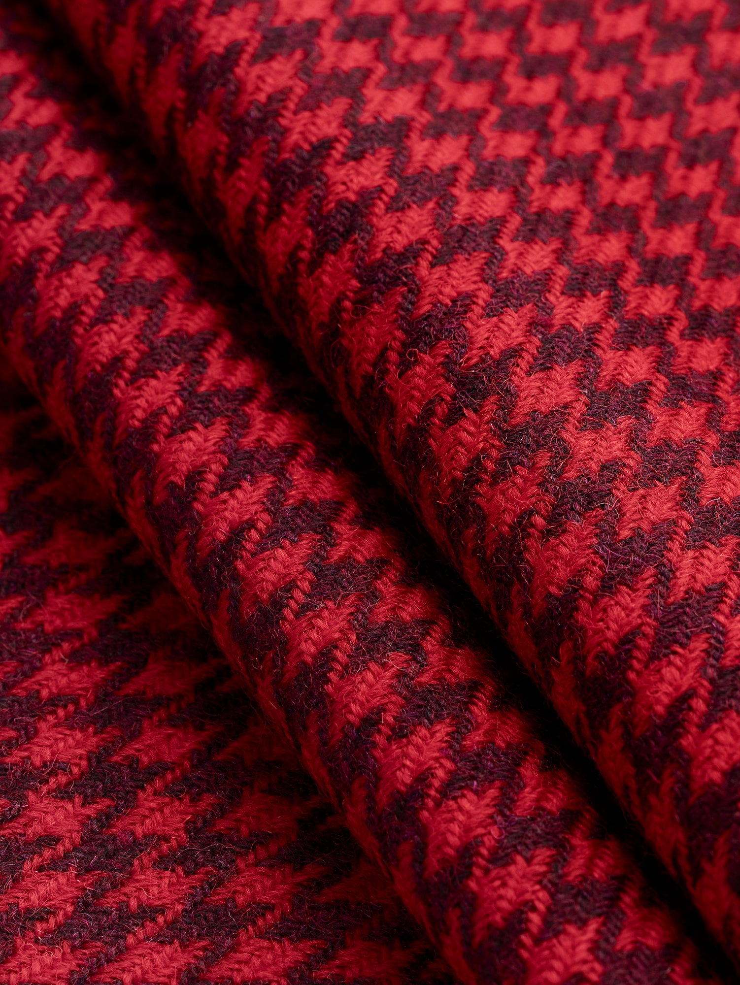 F-WOL124-Houndstooth-Italian-Wool-Suiting-Deadstock-Red-and-Plum-Core-Fabrics-fold.JPG