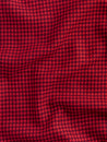 F-WOL124-Houndstooth-Italian-Wool-Suiting-Deadstock-Red-and-Plum-Core-Fabrics-scrunched.JPG