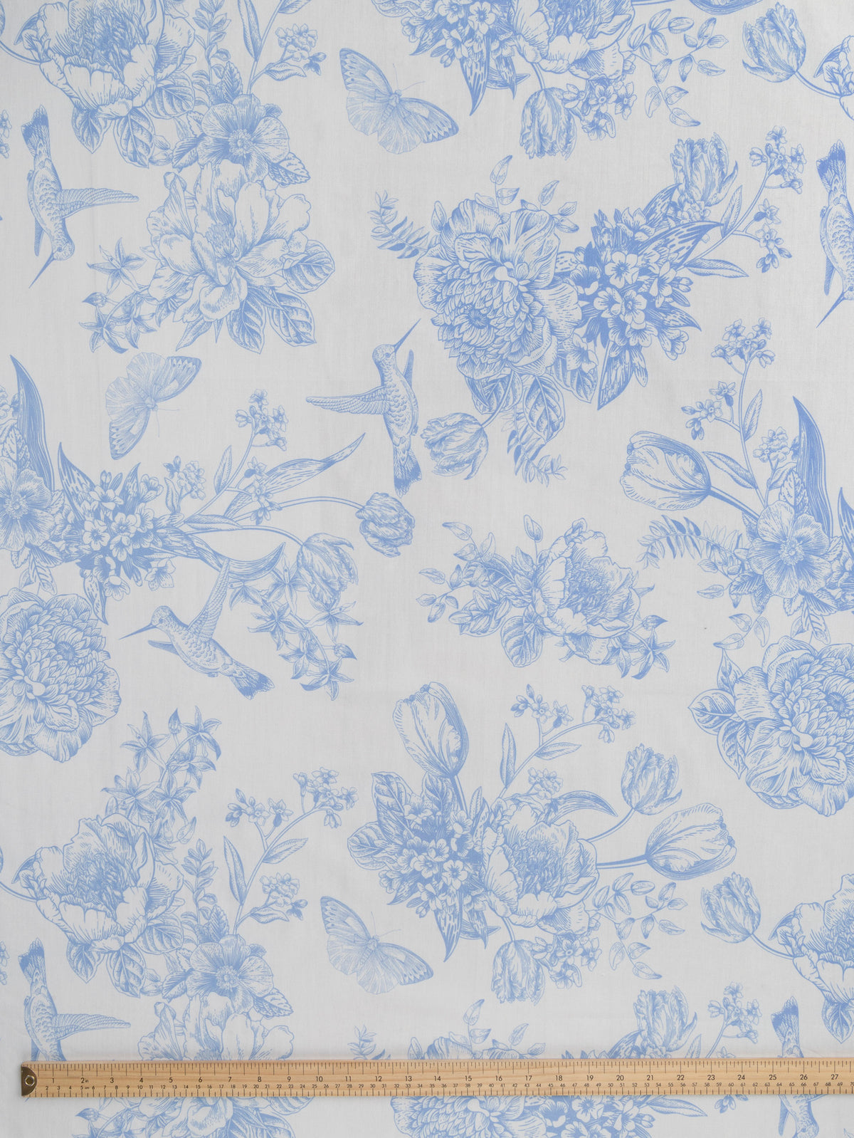 F-COT499-Hummingbird-Toile-de-Jouy-Print-Cotton-Poplin-Ivory-and-Chambray-Core-Fabrics-ruler.webp