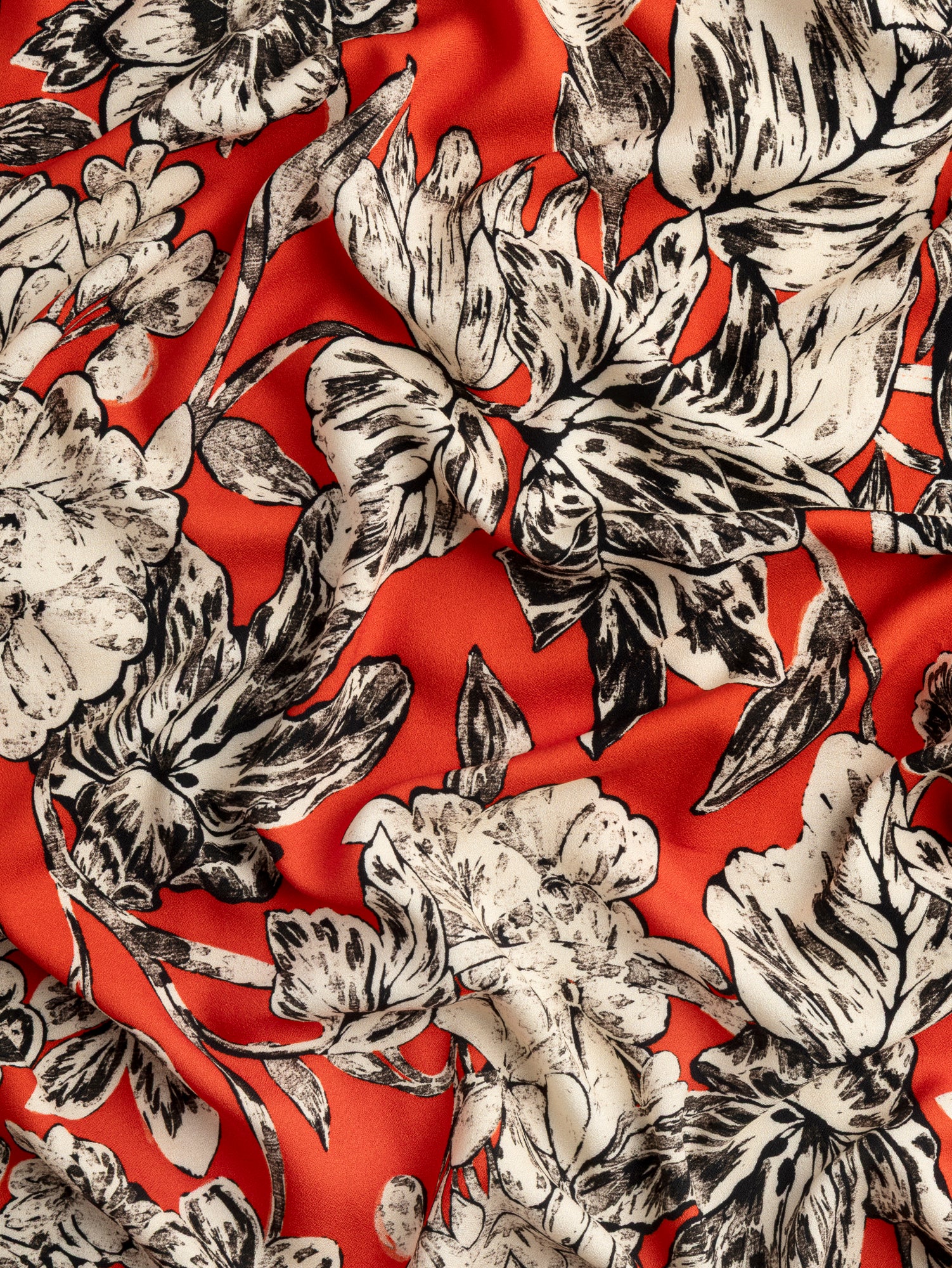 F-VIS278-Illustrated-Magnolia-Print-Viscose-Crepe-Red-Black-Cream-Core-Fabrics-scrunched.JPG