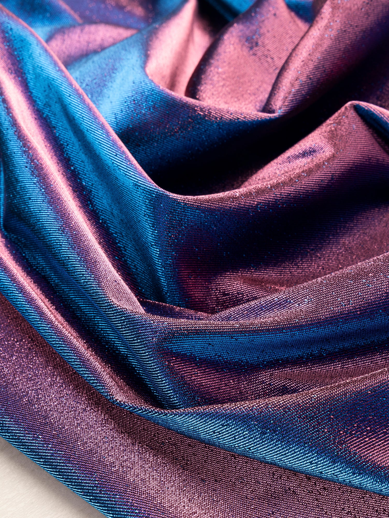 F-DEA103-Iridescent-Lamé-Stretch-Twill-Pink-Blue-Core-Fabrics-scrunched.JPG