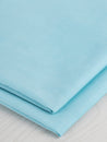 F-TEN016-004-Japanese-Tencel-Cotton-Voile-Sky-Blue-Core-Fabrics-fold.JPG