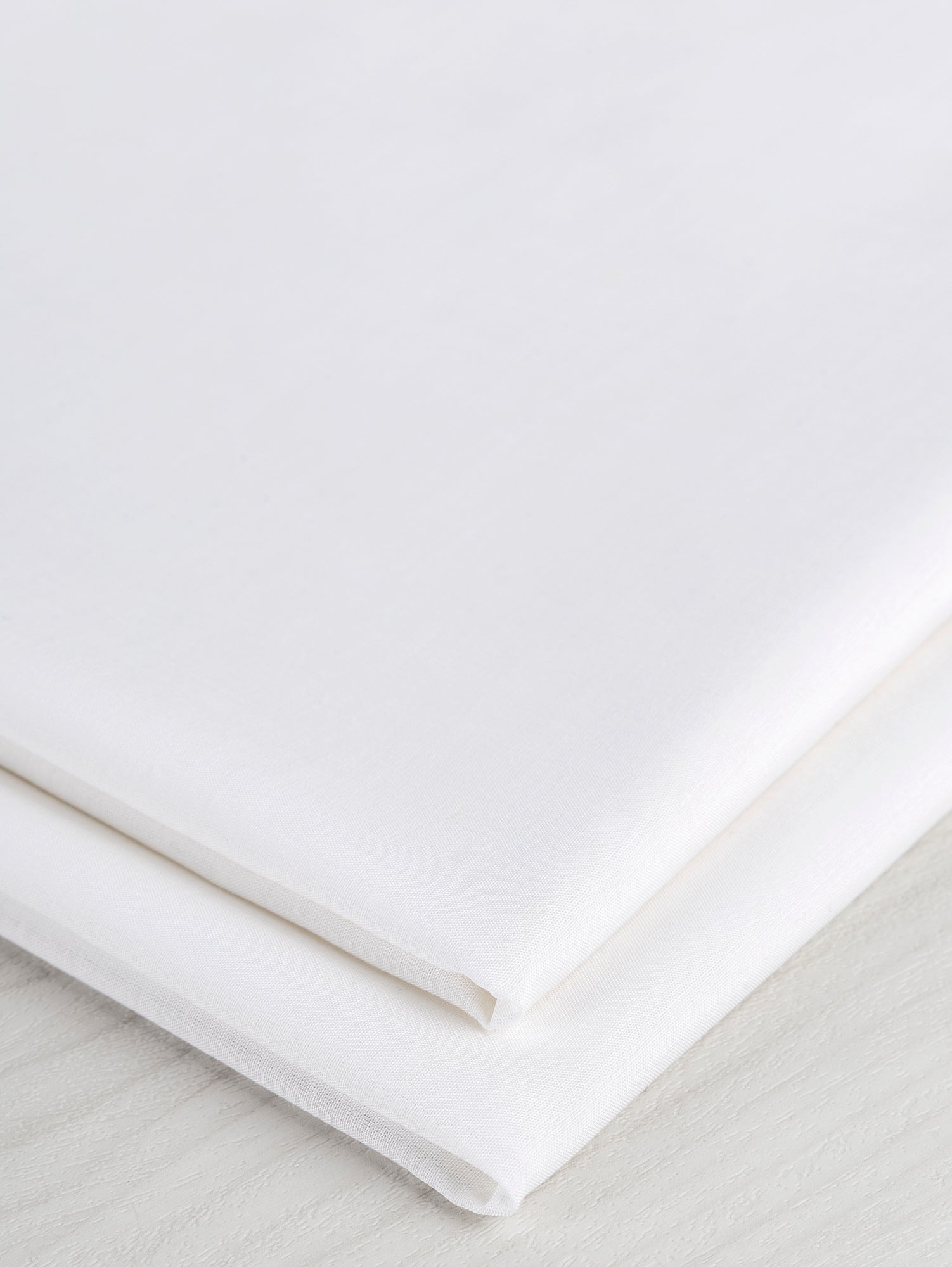 F-TEN016-001-Japanese-Tencel-Cotton-Voile-White-Core-Fabrics-fold.JPG