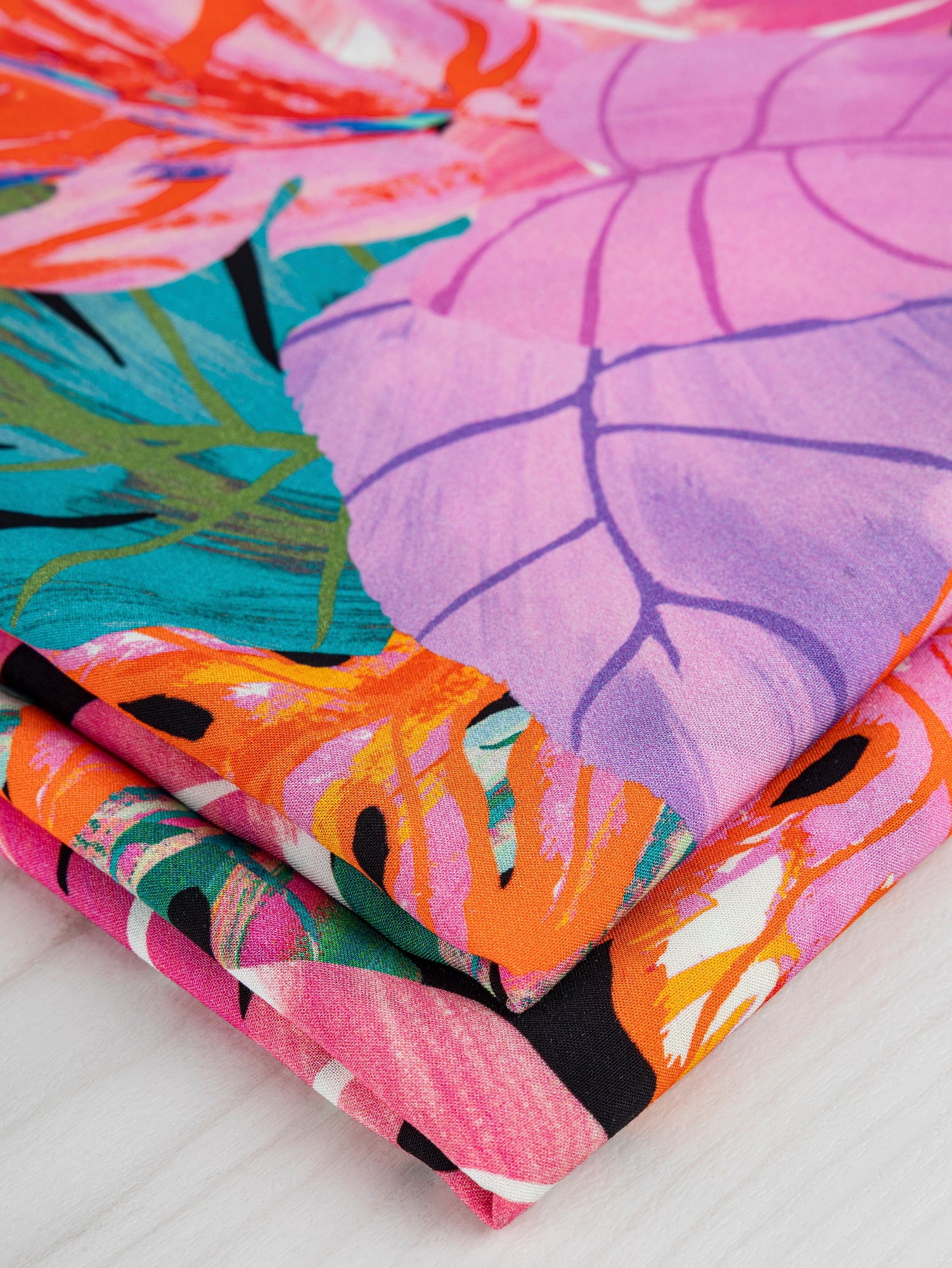 F-VIS249-Jungle-Electric-Print-Ecovero-Viscose-Navy+Electric Blue+Lime+Violet-Core-Fabrics-fold.JPG