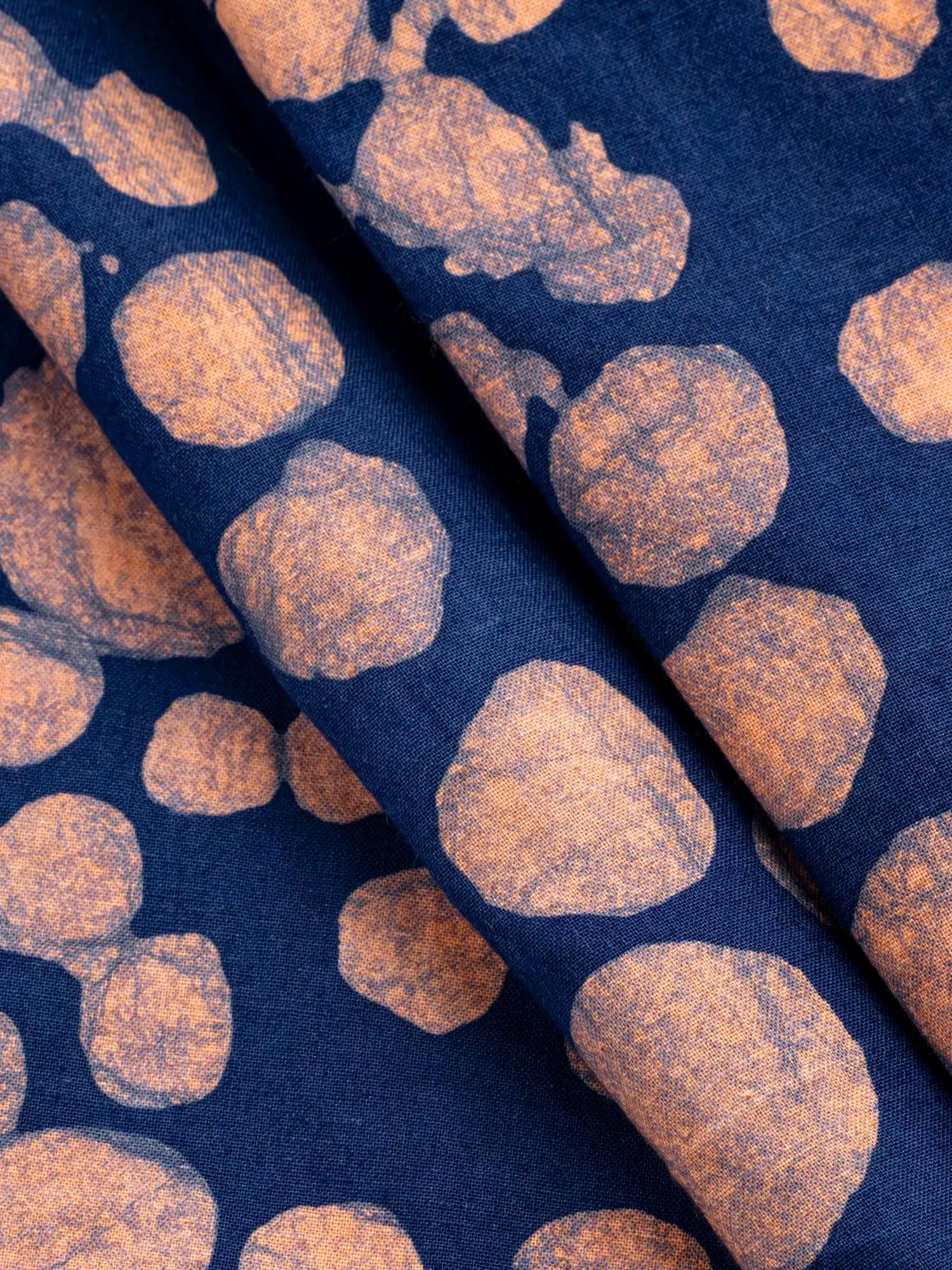 F-COT428-Large-Dot-Artisanal-Cotton-Batik-Blue-and-Coral-Core-Fabrics-fold.webp