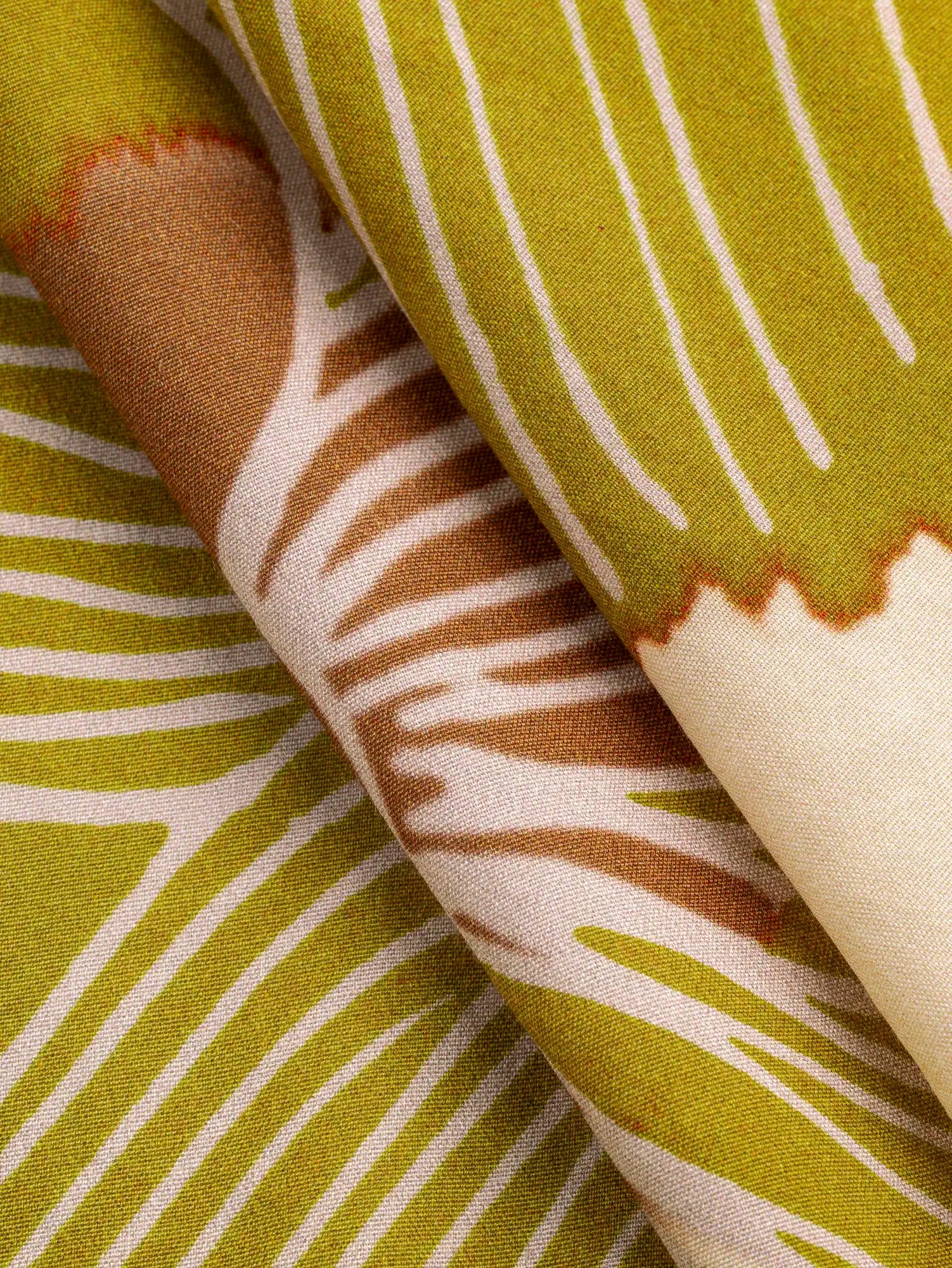 F-VIS289-Large-Floral-Print-Viscose-Oat-Mustard-Caramel-Core-Fabrics-fold.webp