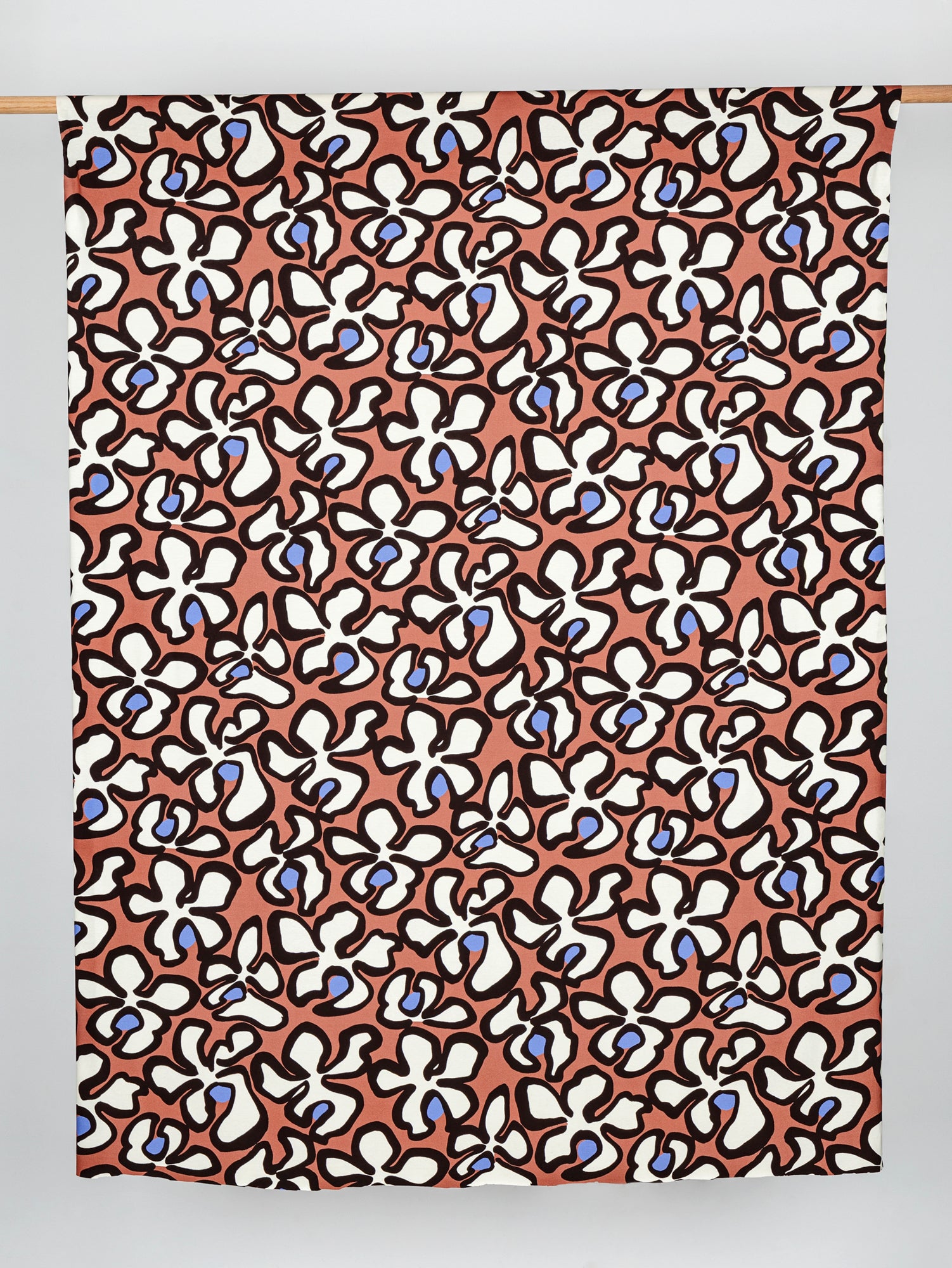 F-VIS267-Large-Squiggle-Bloom-Print-Viscose-Knit-Cream-Brown-Periwinkle-Core-Fabrics-draped.JPG