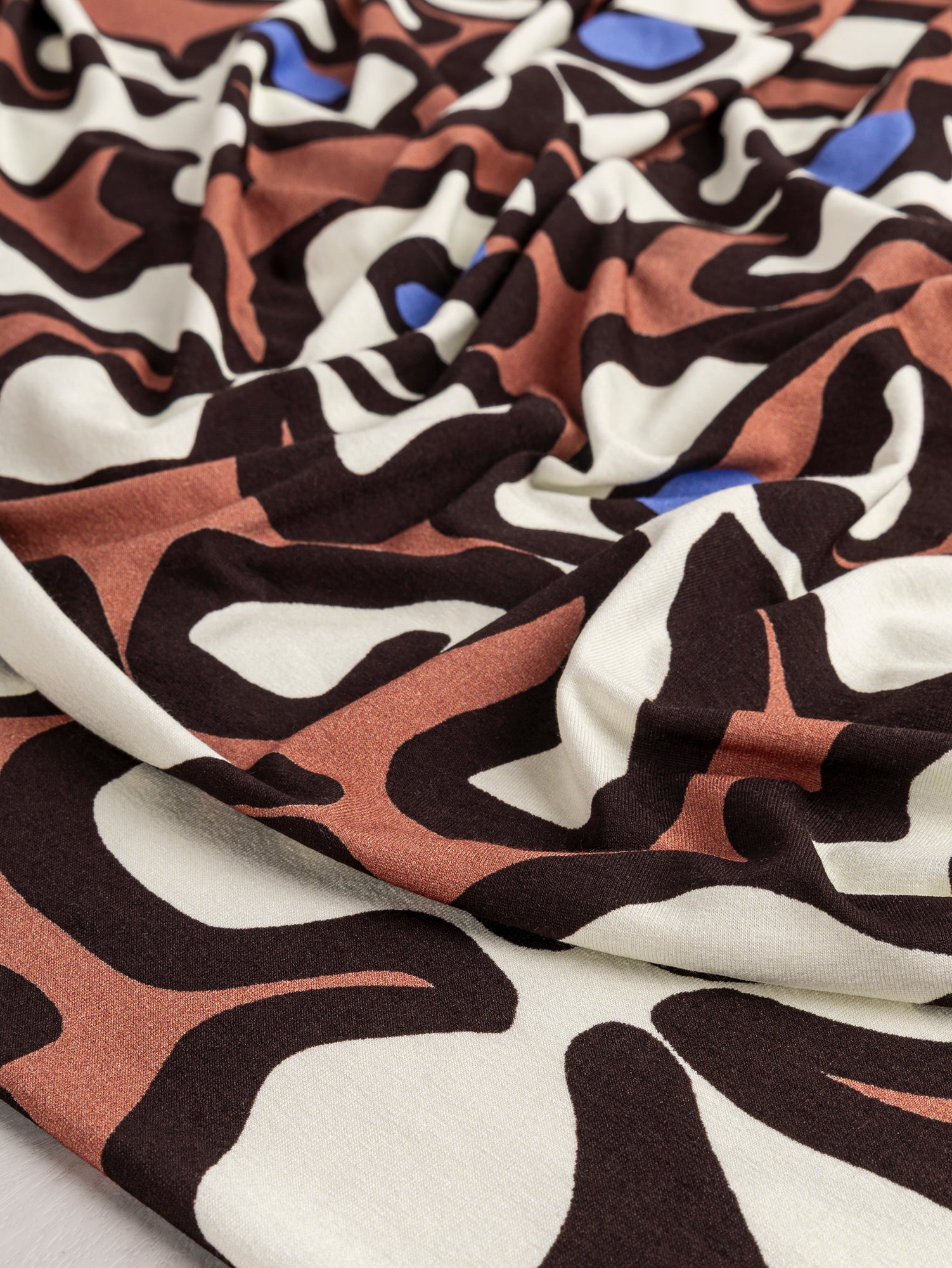 F-VIS267-Large-Squiggle-Bloom-Print-Viscose-Knit-Cream-Brown-Periwinkle-Core-Fabrics-scrunched-2.JPG