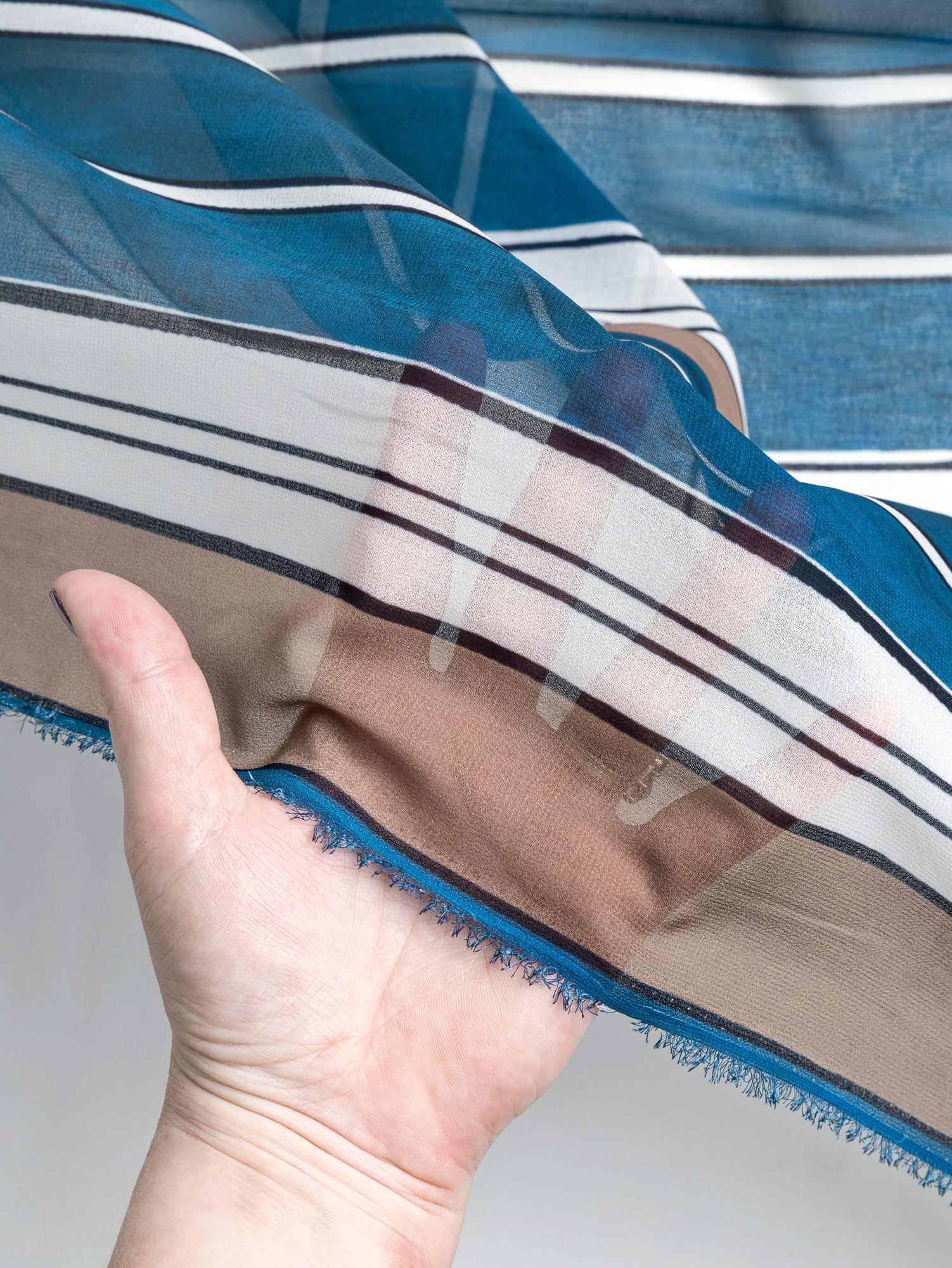 F-DEA070-Large-Stripe-Viscose-Chiffon-Deadstock-LondonBlue+Brown+Cream+Navy-Core-Fabrics-hand.JPG