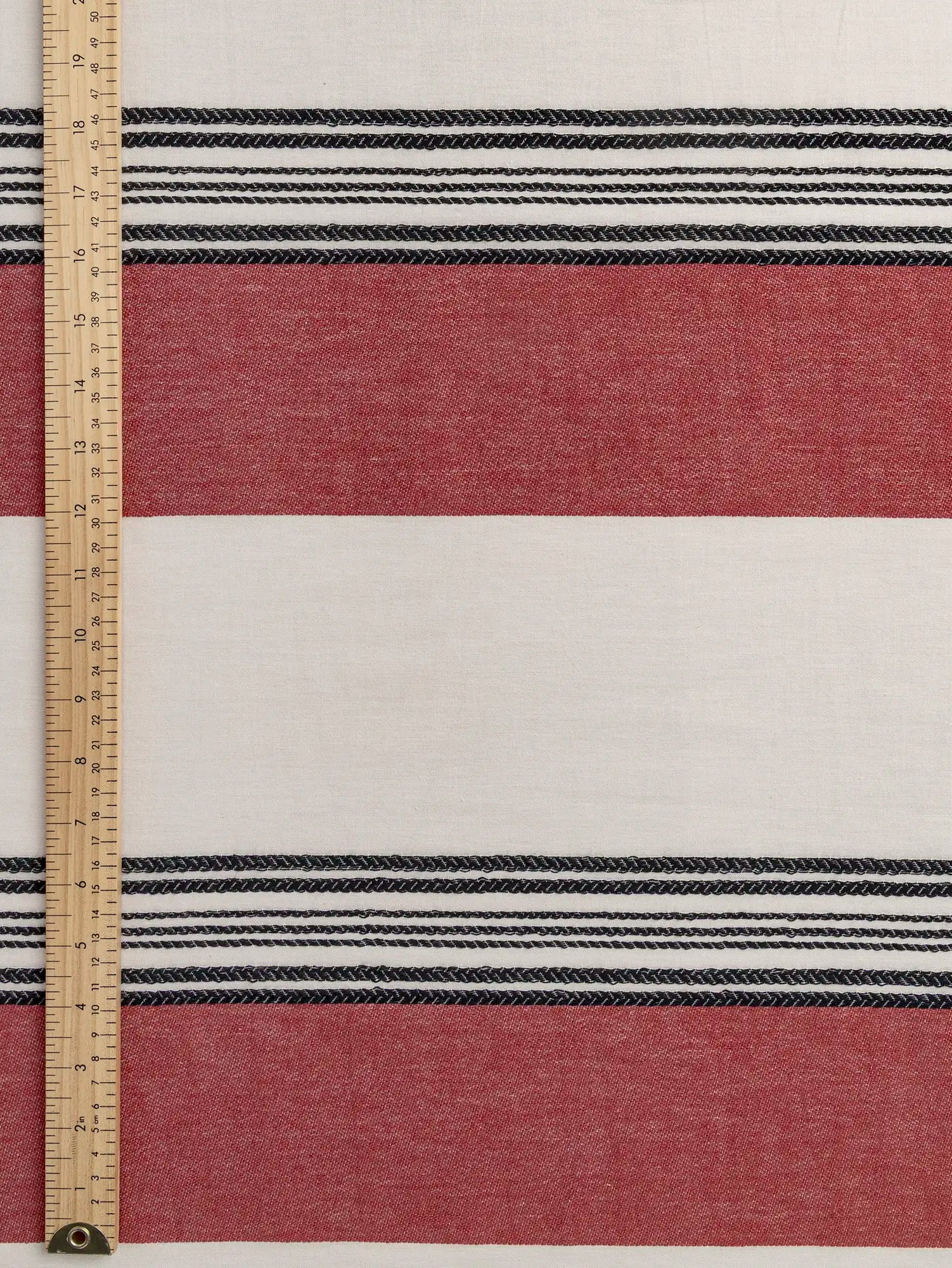 F-DEA219-Large-Textured-Stripe-Cotton-Deadstock-Natural-Black-and-Bordeaux-Core-Fabrics-ruler.webp